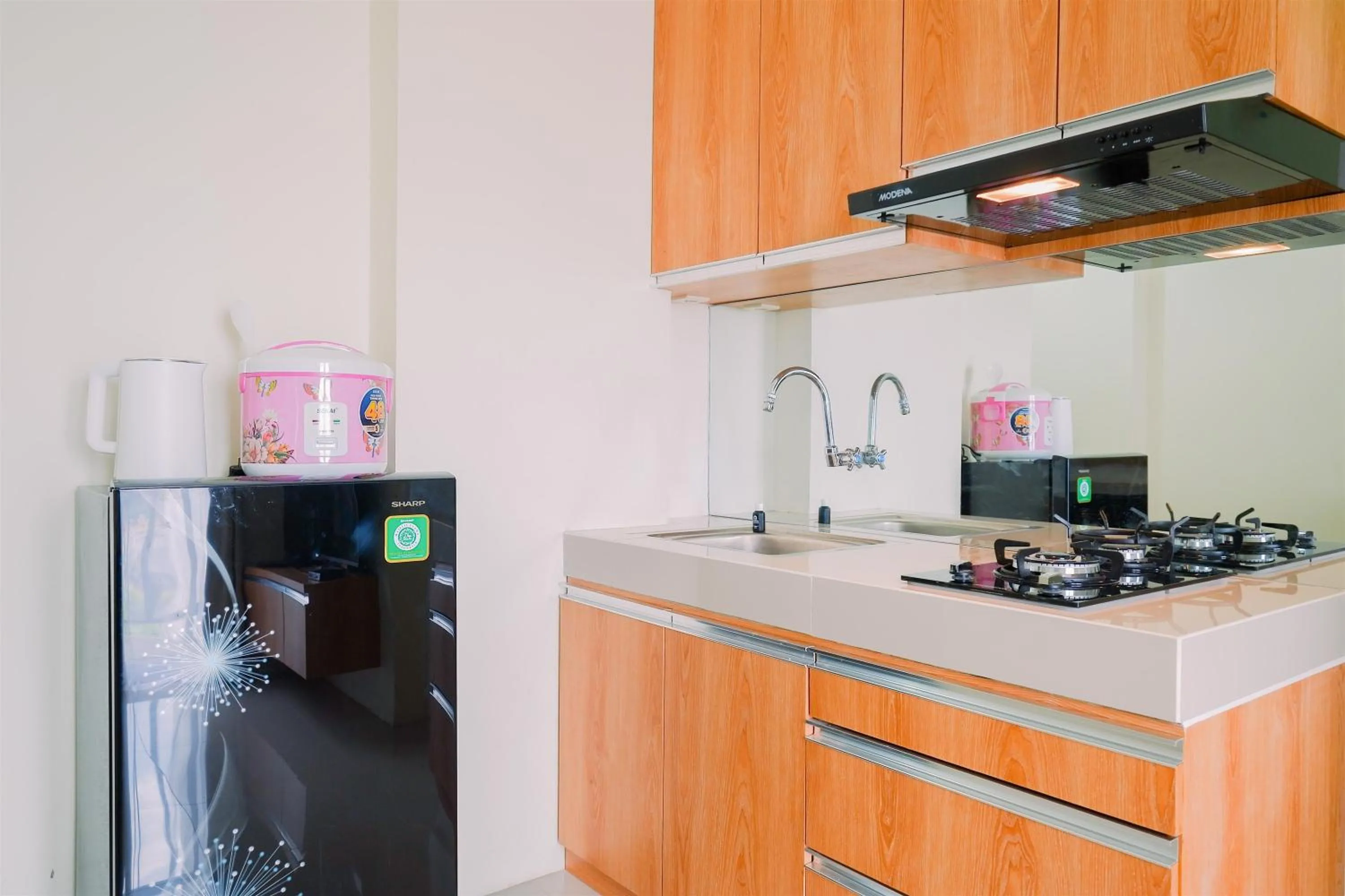 Warm and Cozy Living 2BR Bogorienze Apartment By Travelio