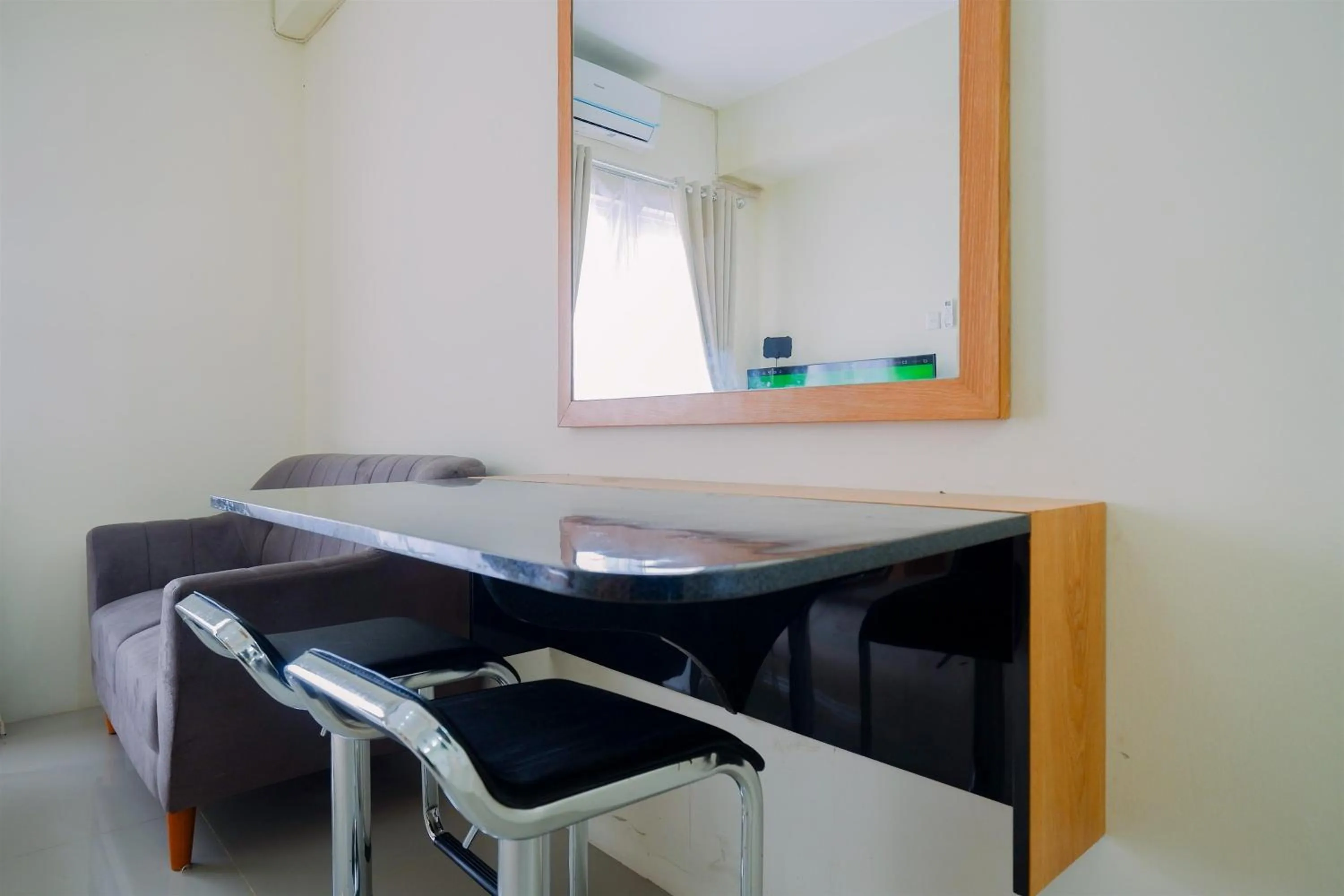 Bed in Warm and Cozy Living 2BR Bogorienze Apartment By Travelio