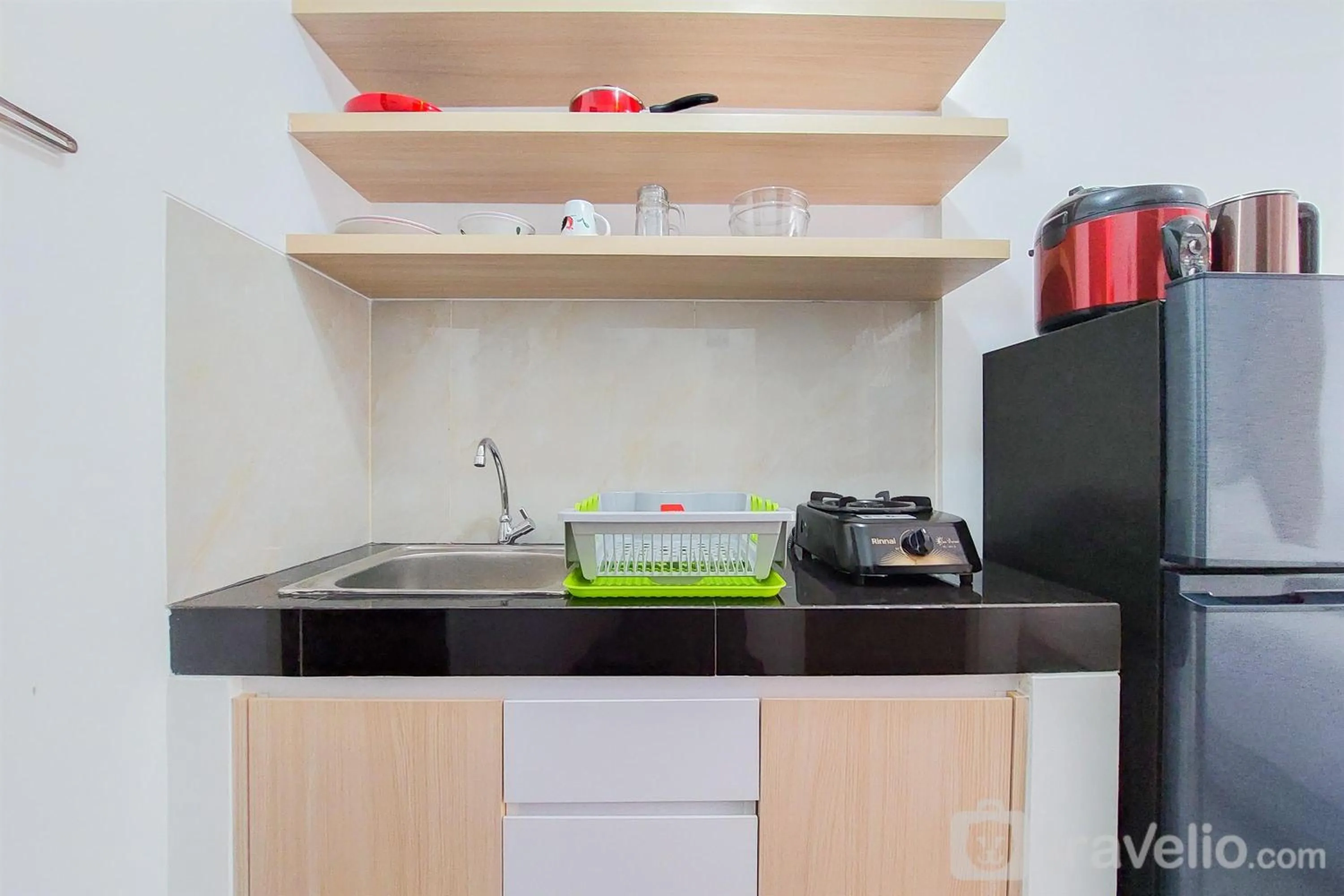 Enjoy Living and Warm Studio at Serpong Garden Apartment By Travelio