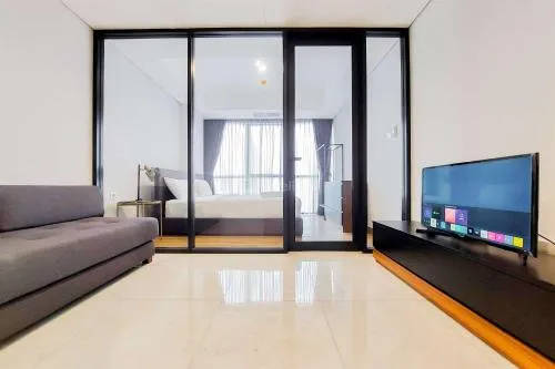 Comfort Living and Homey 1BR The Smith Alam Sutera Apartment By Travelio