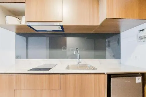 Comfort Living and Homey 1BR The Smith Alam Sutera Apartment By Travelio