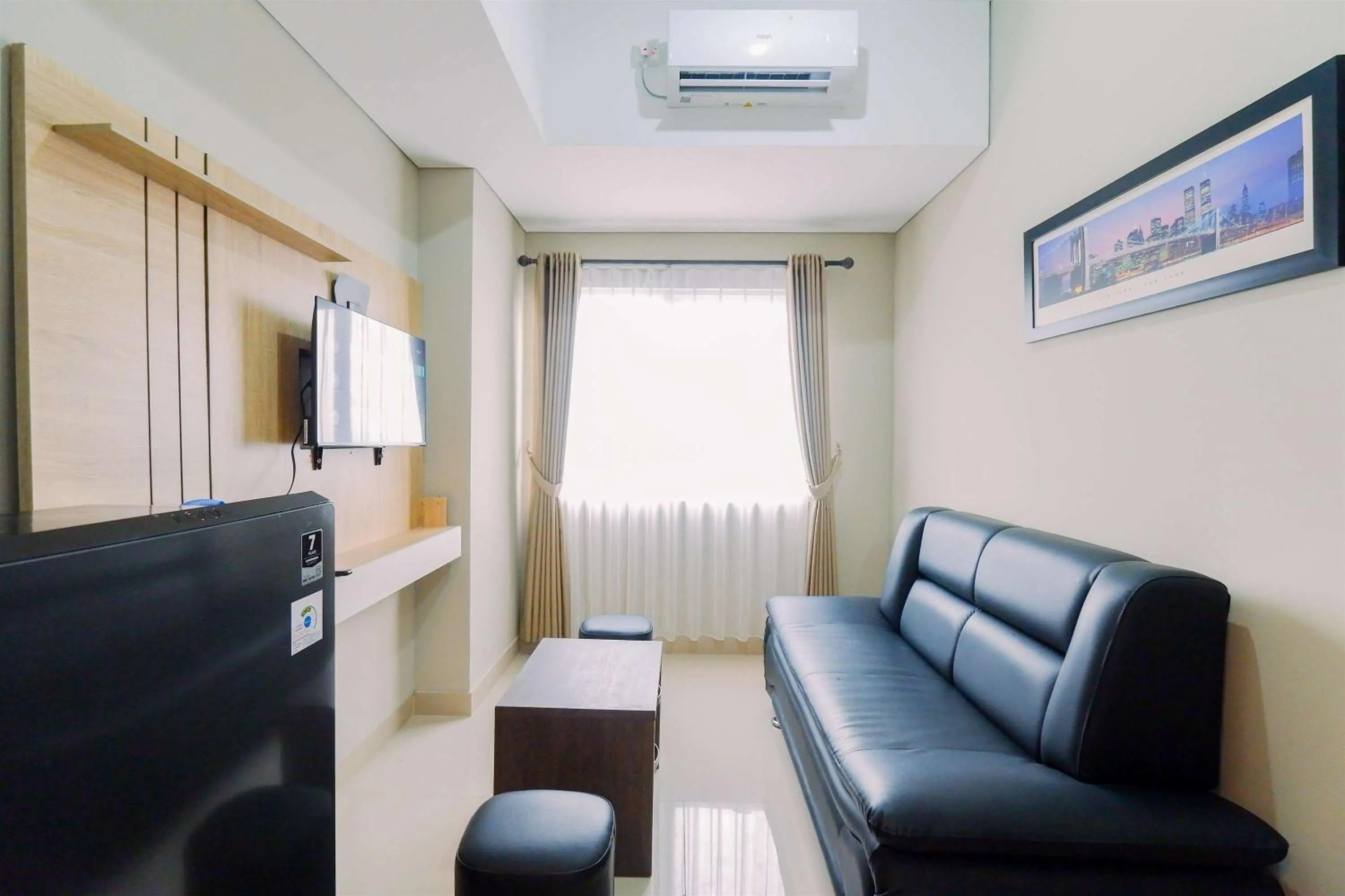 Homey and Minimalist 1BR Royal Sentul Park Apartment By Travelio