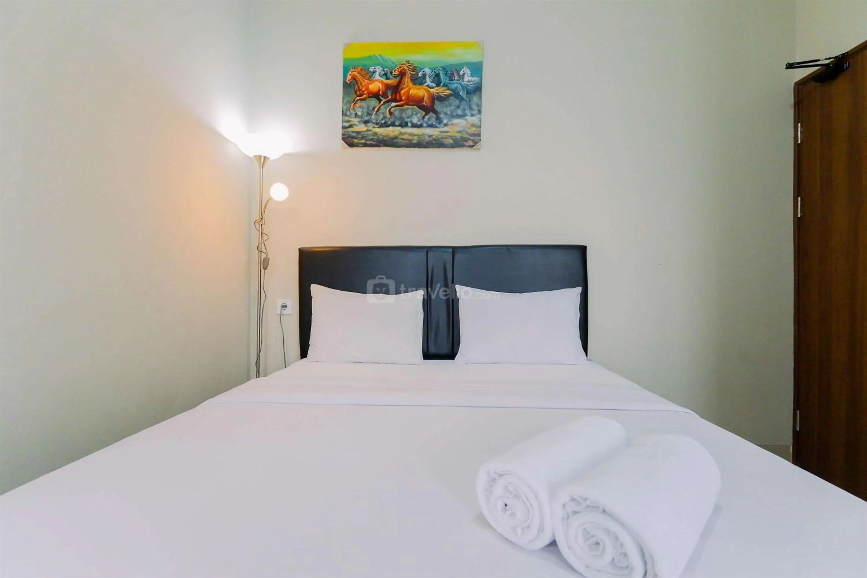 Homey and Minimalist 1BR Royal Sentul Park Apartment By Travelio
