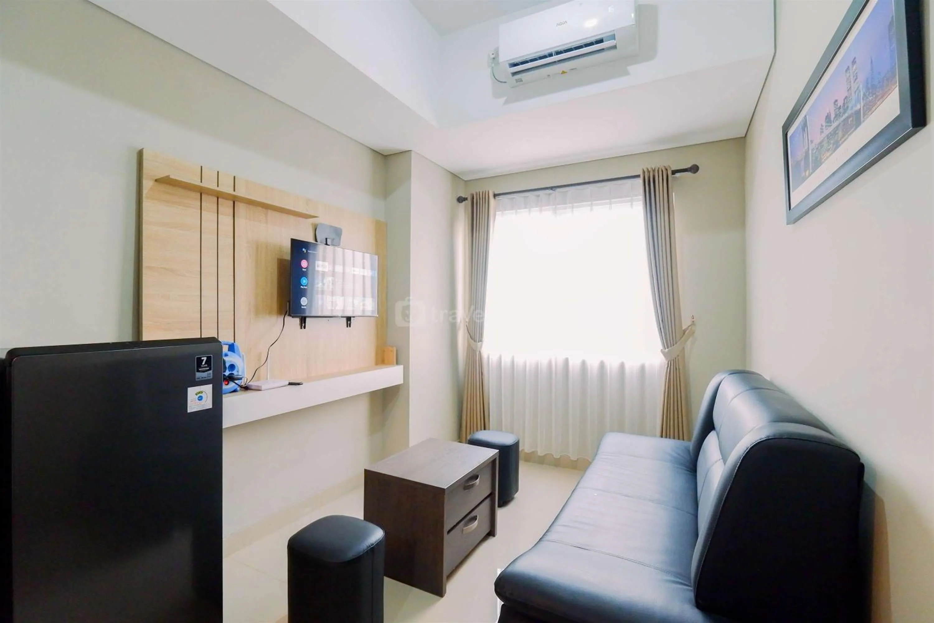 Homey and Minimalist 1BR Royal Sentul Park Apartment By Travelio