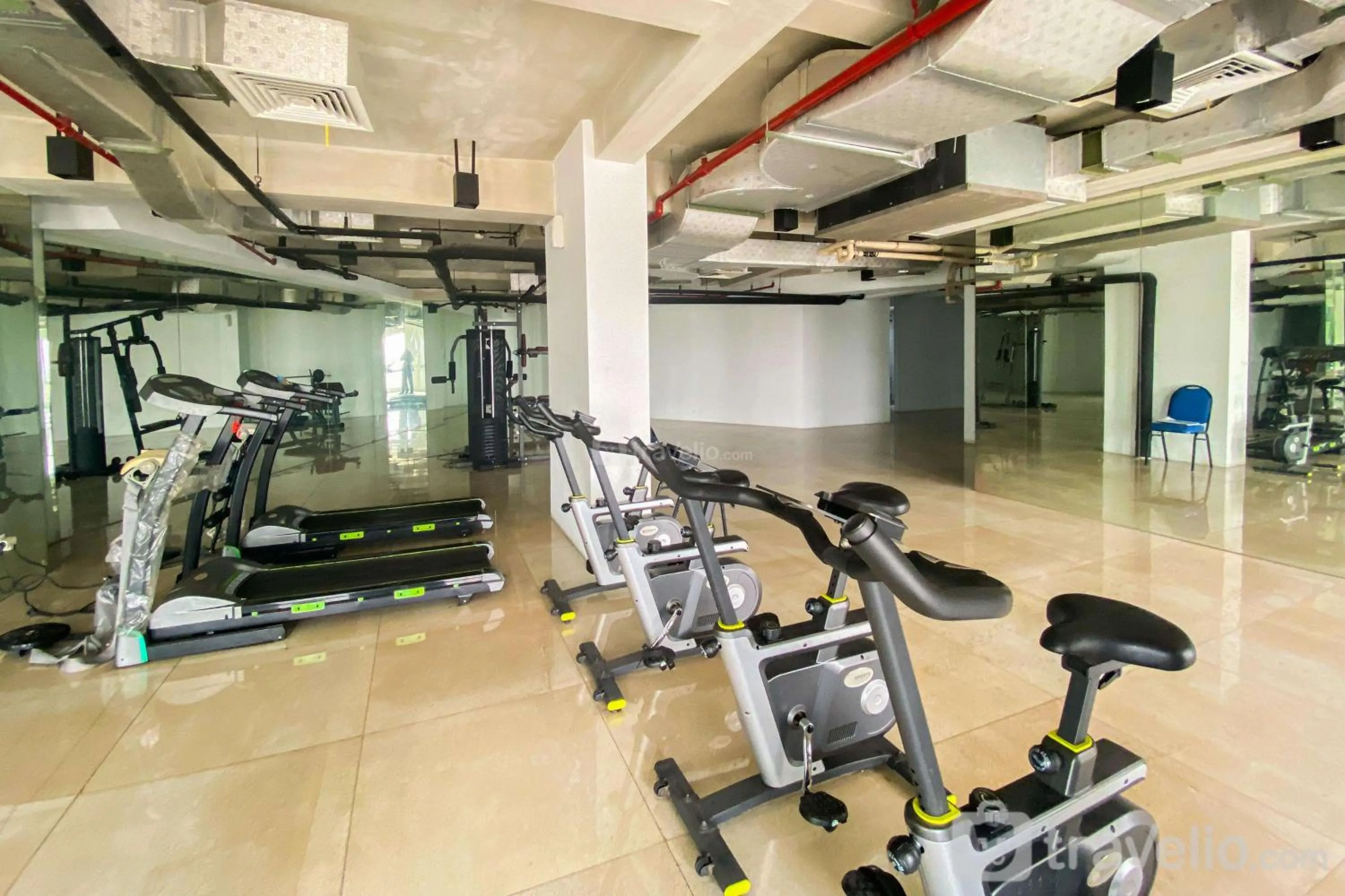Comfort 1BR at Patraland Urbano Apartment By Travelio
