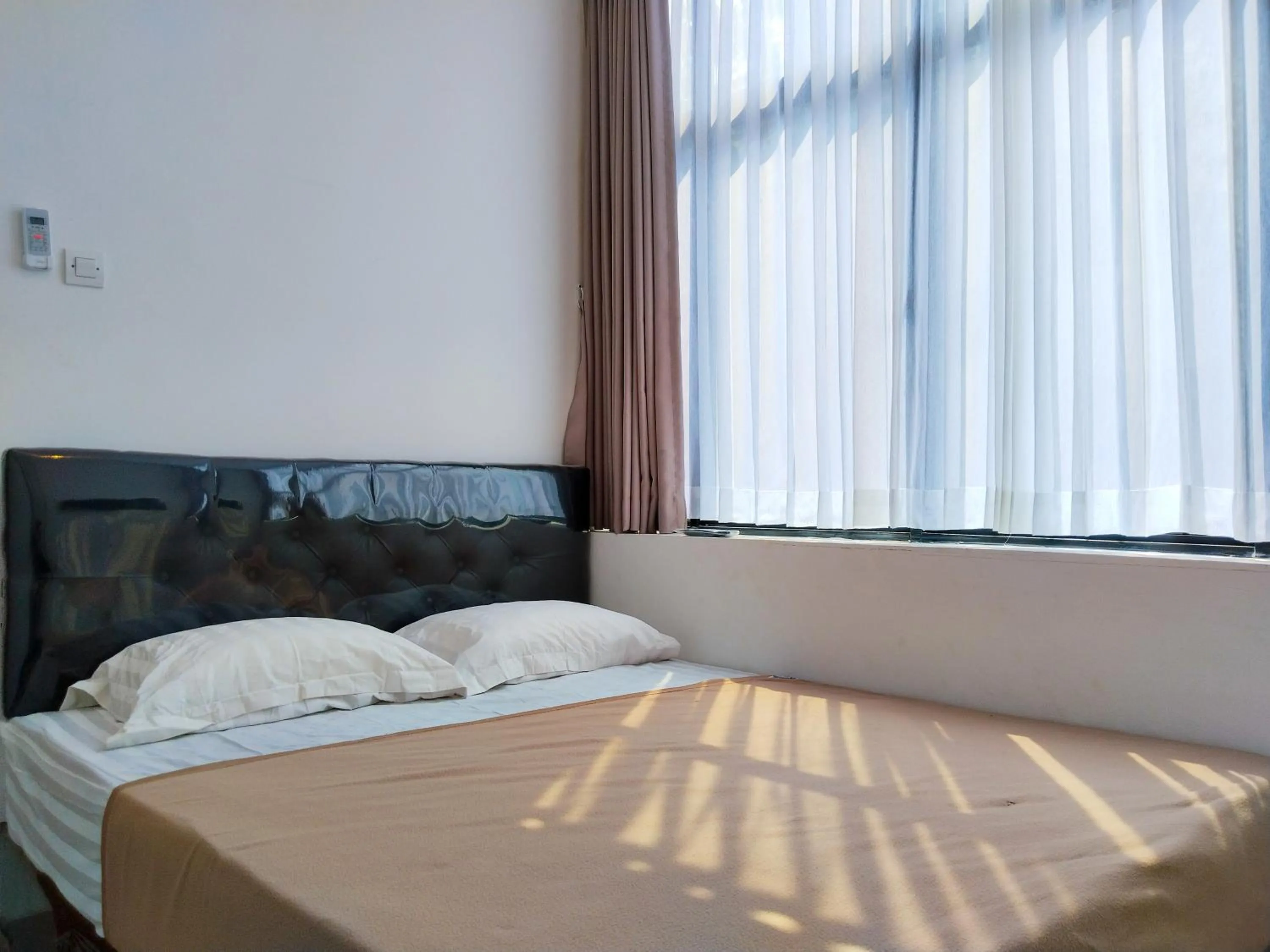 Bed in Themas Guest House