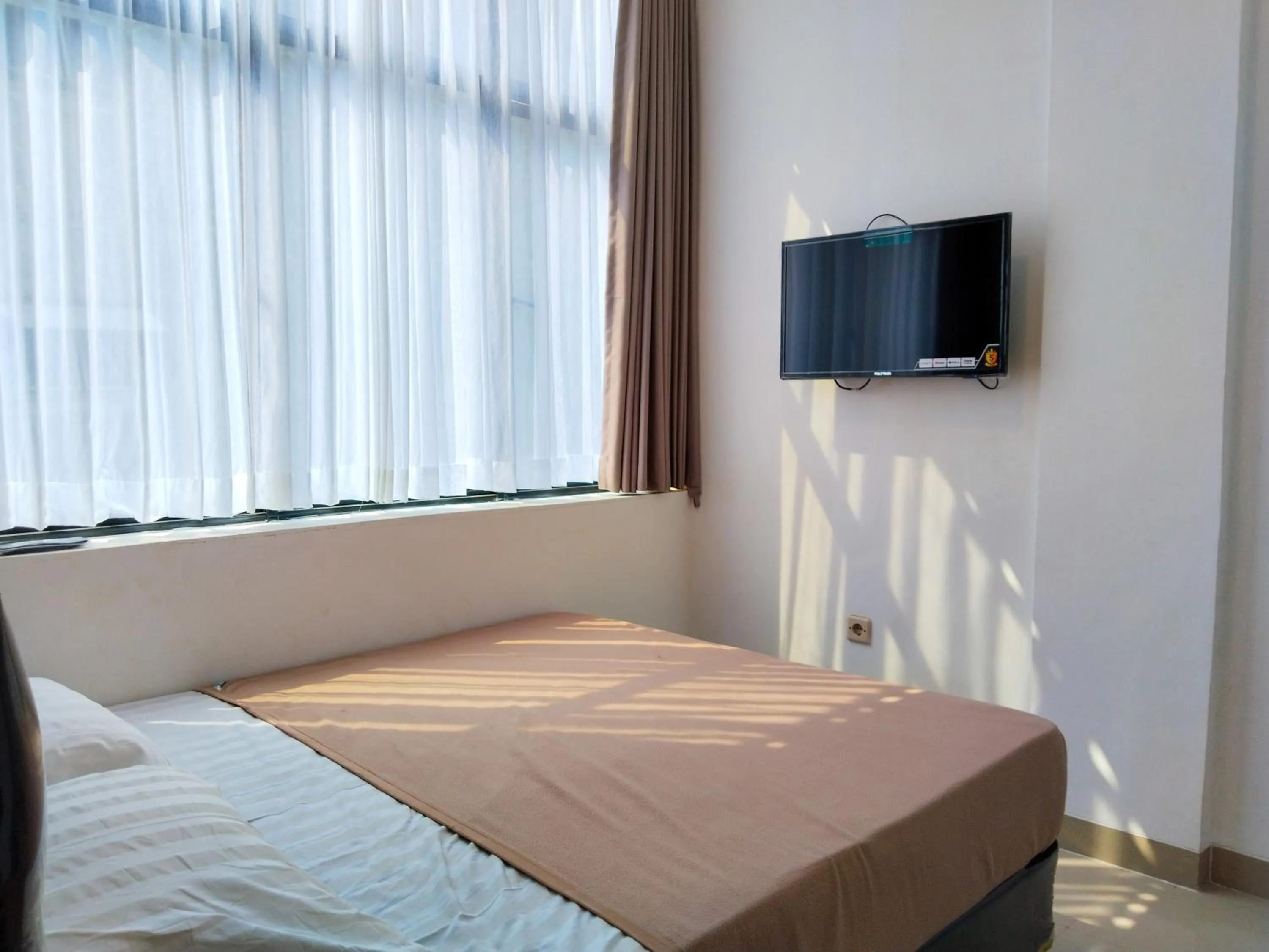 Bed in Themas Guest House