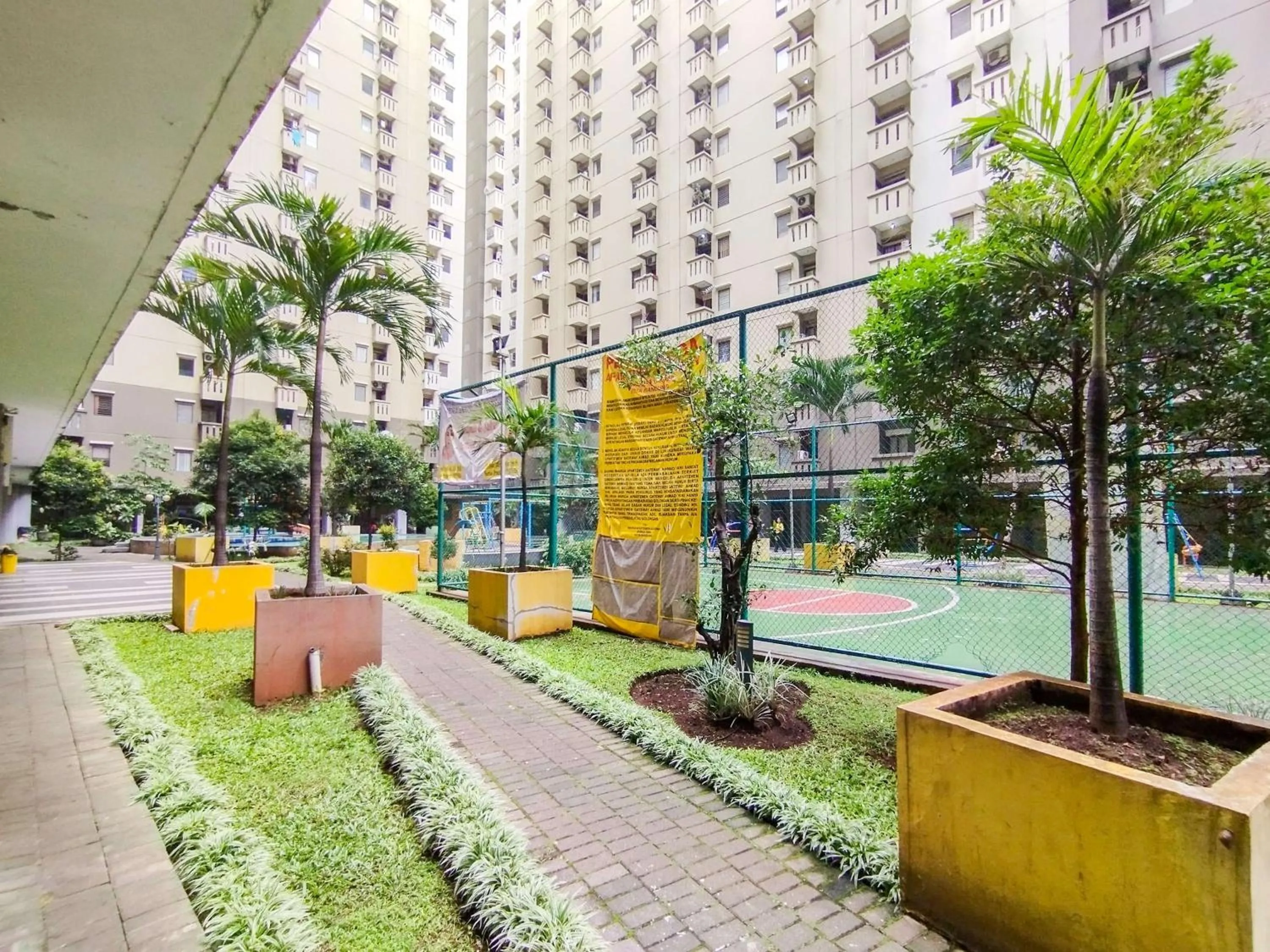 Bed in Serene 2BR Apartment at Gateway Ahmad Yani Cicadas By Travelio
