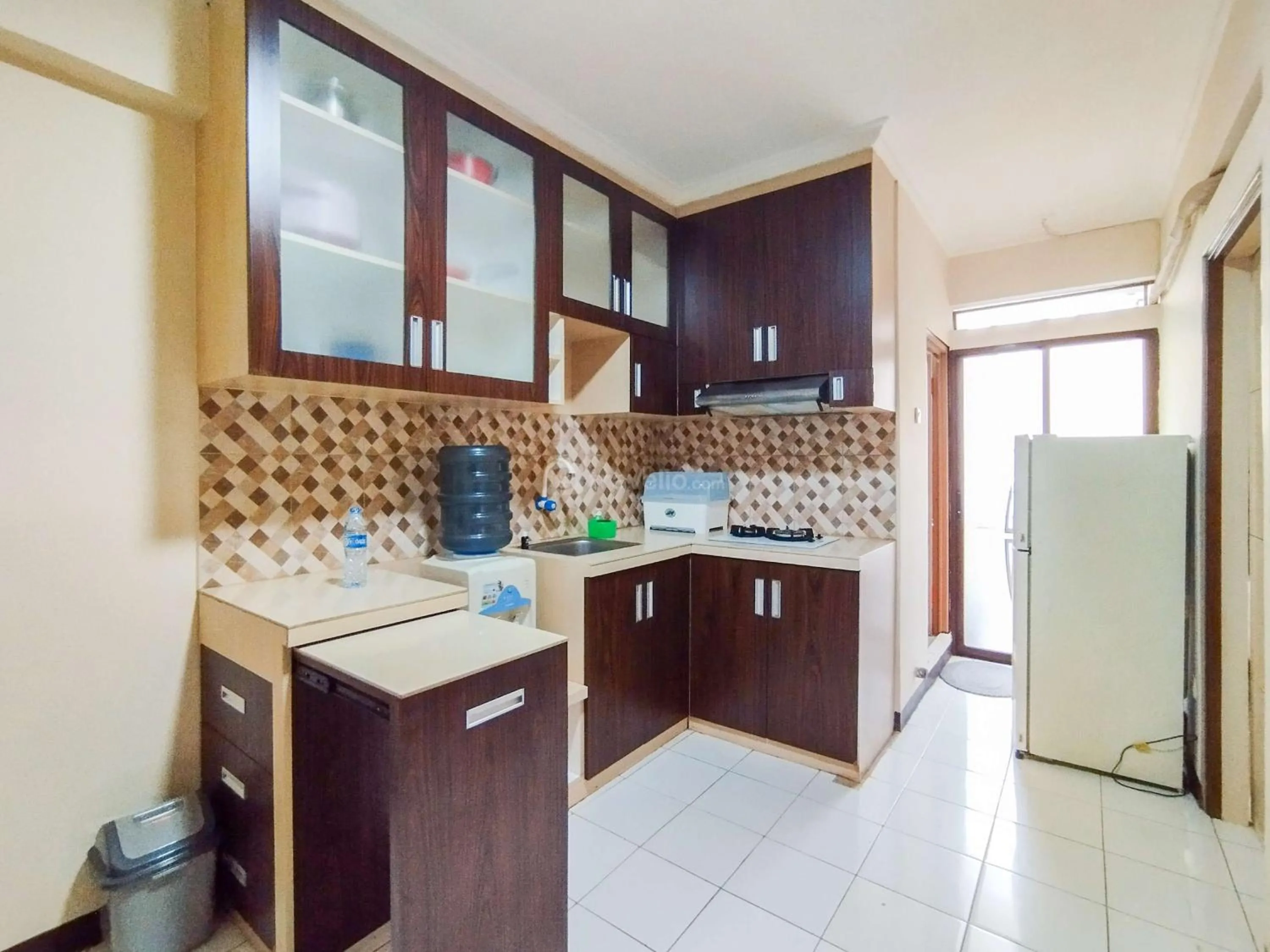 Bed in Serene 2BR Apartment at Gateway Ahmad Yani Cicadas By Travelio