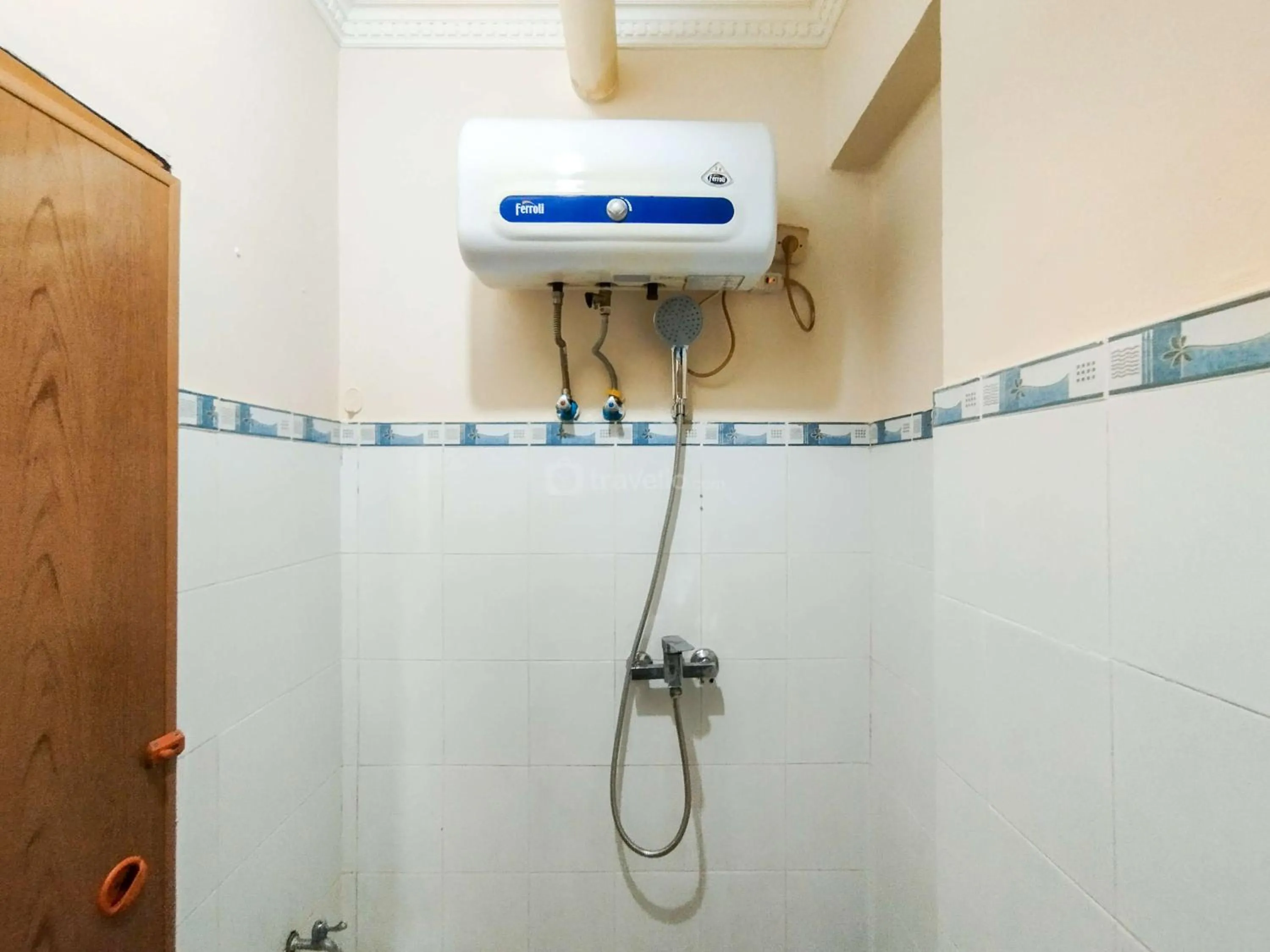 Bed in Serene 2BR Apartment at Gateway Ahmad Yani Cicadas By Travelio