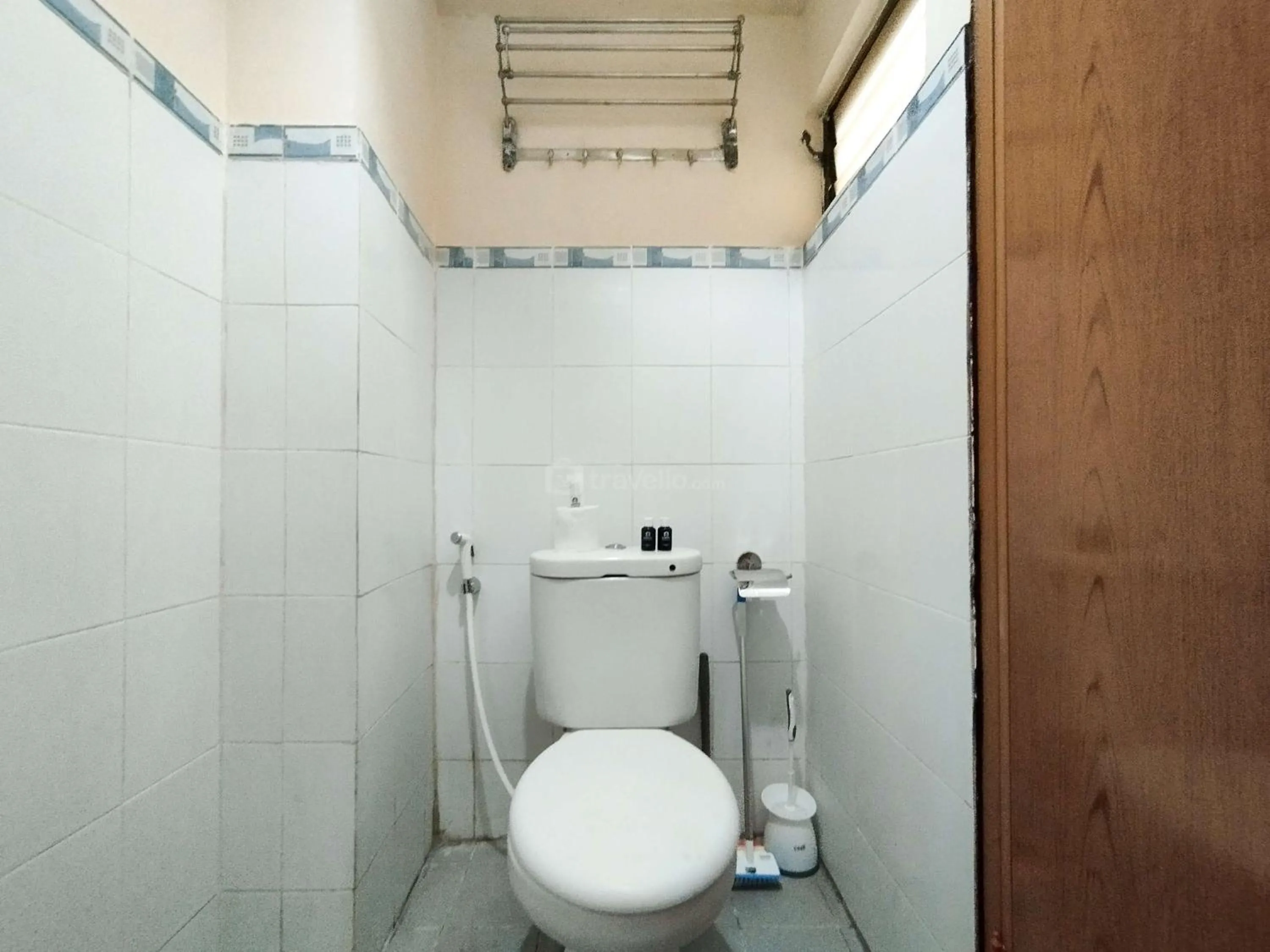 Bed in Serene 2BR Apartment at Gateway Ahmad Yani Cicadas By Travelio