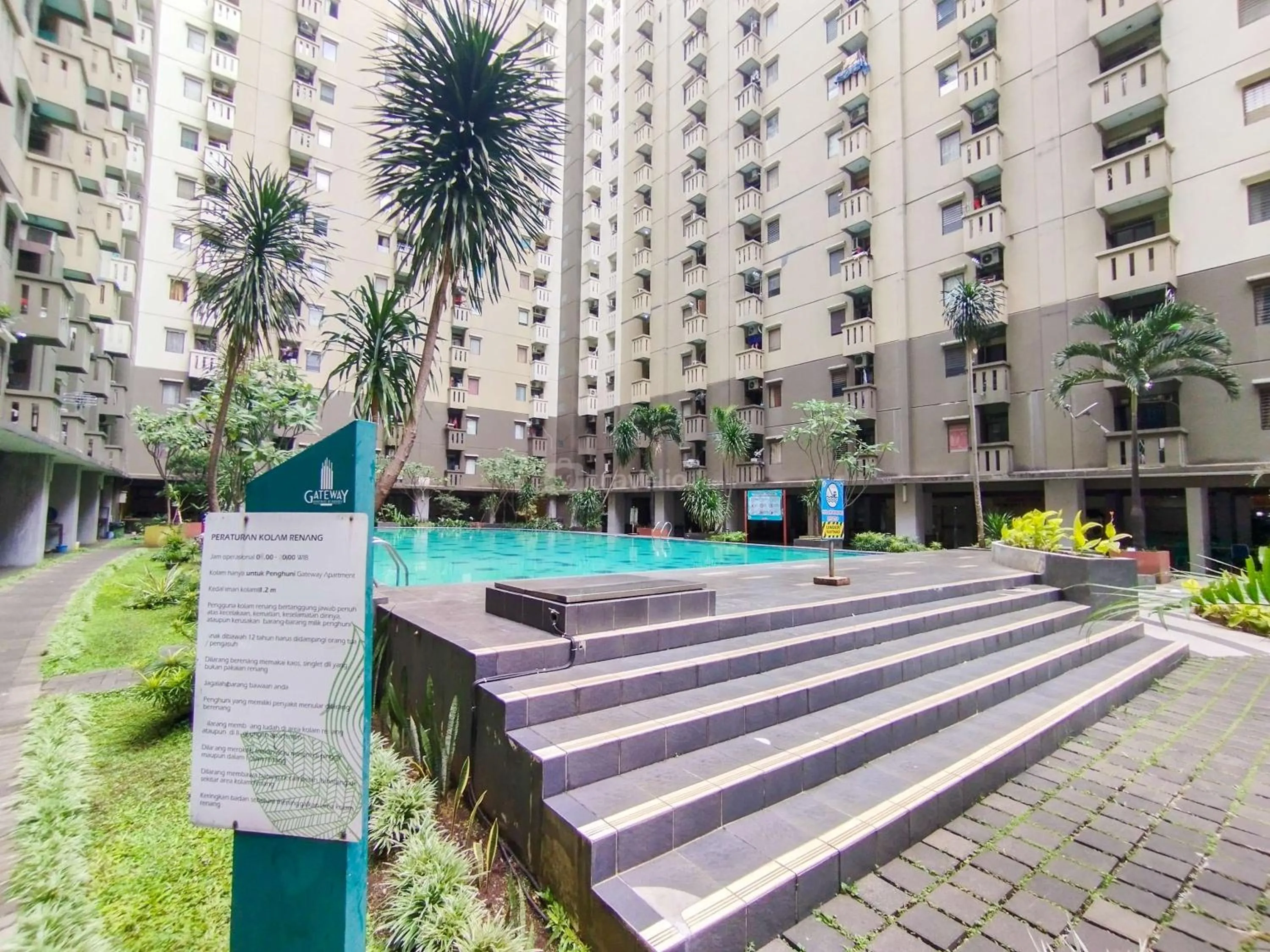 Bed in Serene 2BR Apartment at Gateway Ahmad Yani Cicadas By Travelio