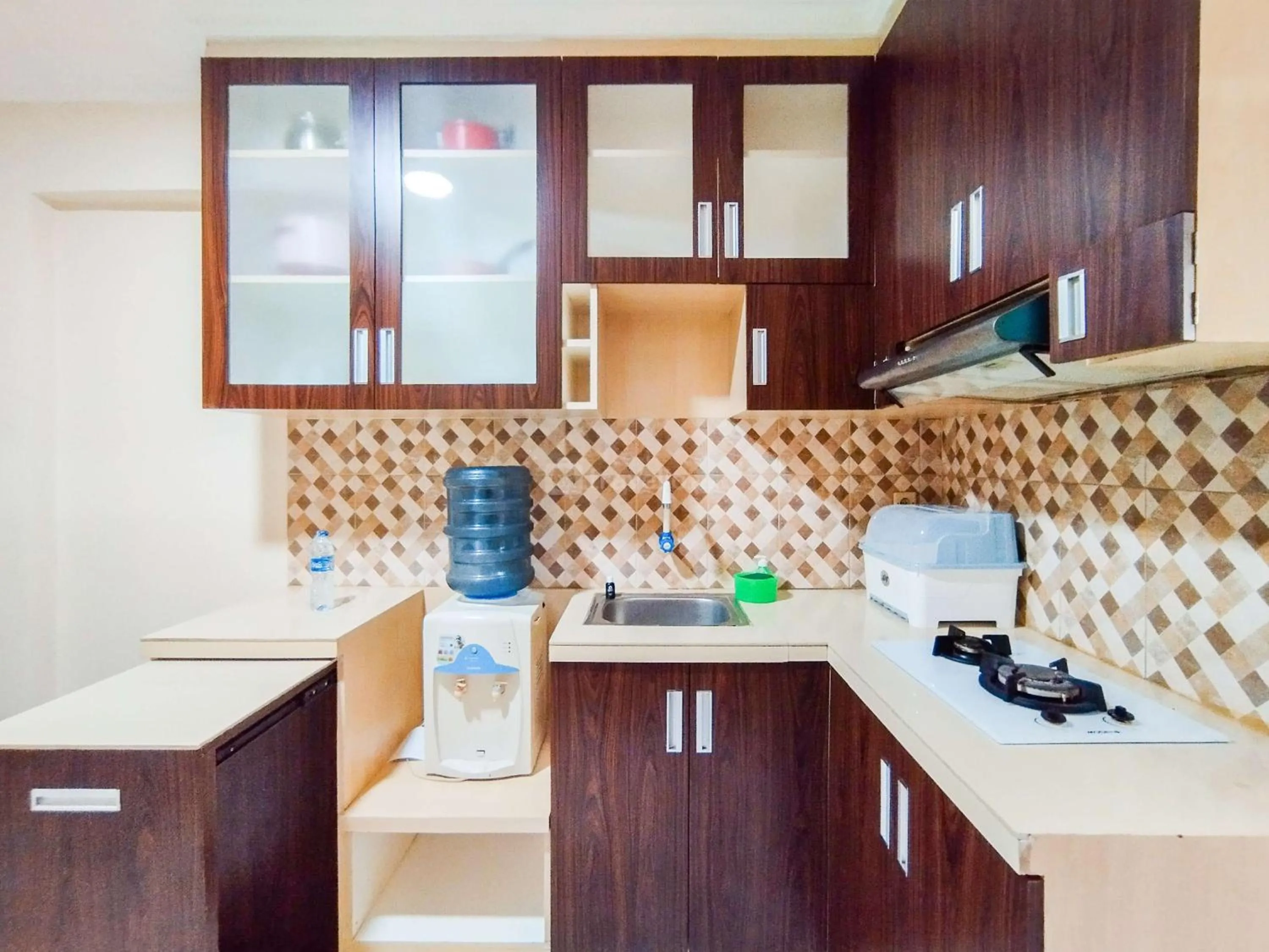 Bed in Serene 2BR Apartment at Gateway Ahmad Yani Cicadas By Travelio