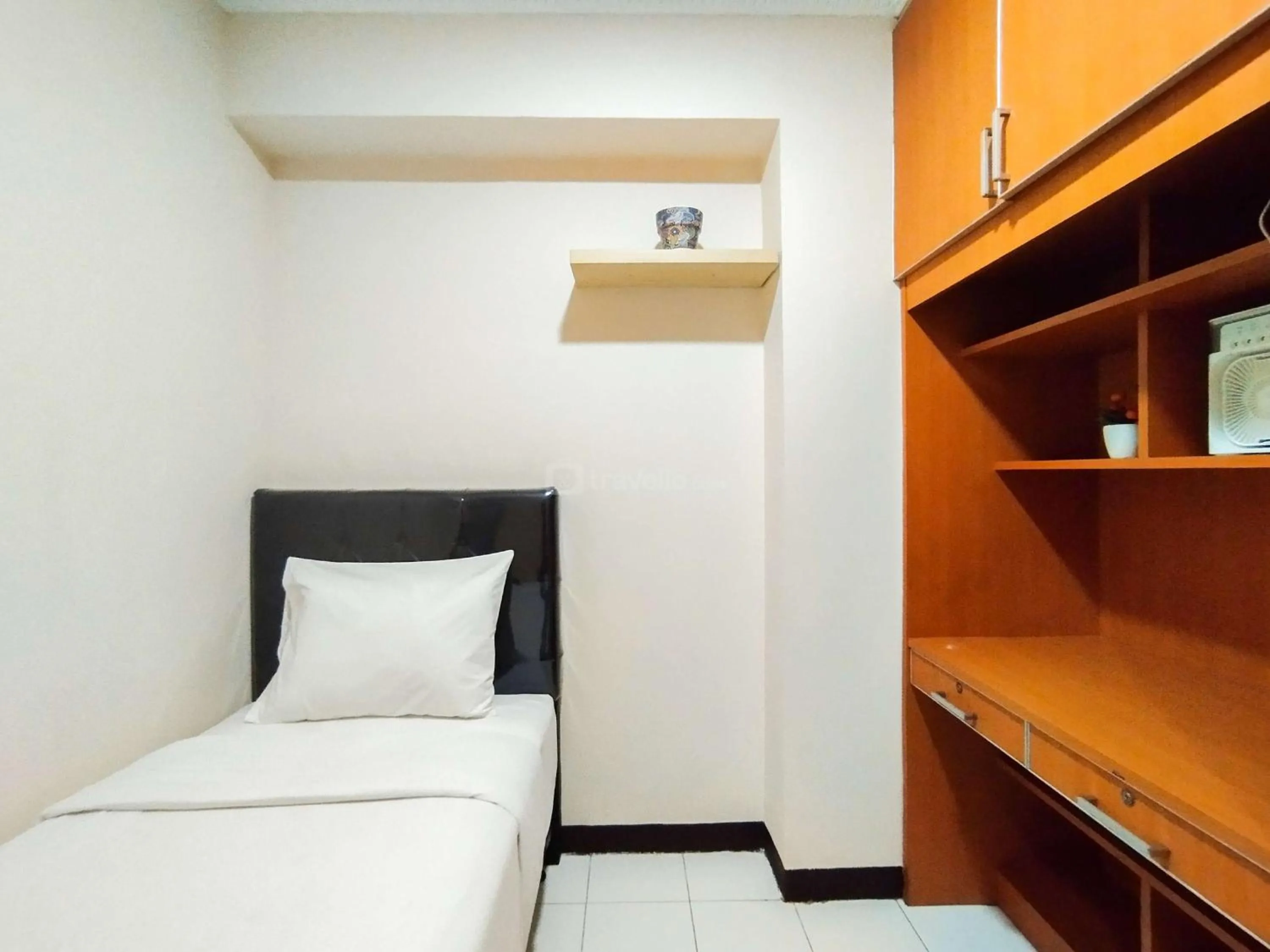 Bed in Serene 2BR Apartment at Gateway Ahmad Yani Cicadas By Travelio