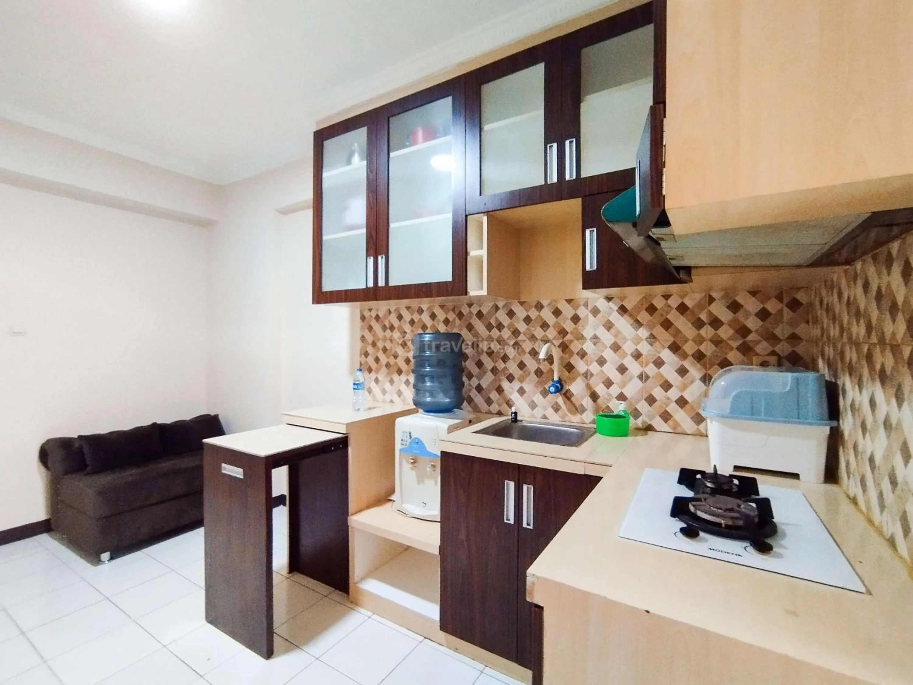 Bed in Serene 2BR Apartment at Gateway Ahmad Yani Cicadas By Travelio