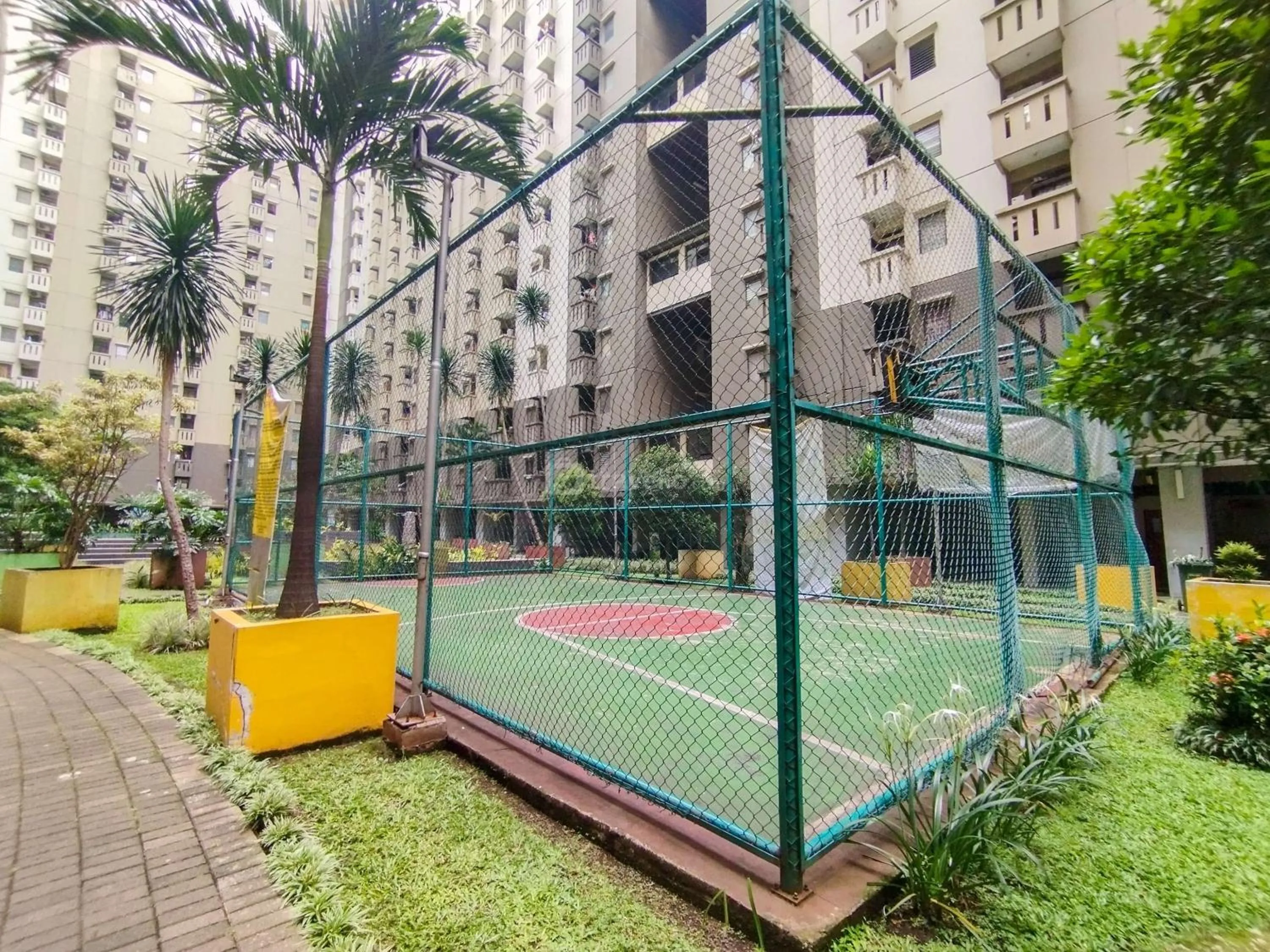 Bed in Serene 2BR Apartment at Gateway Ahmad Yani Cicadas By Travelio