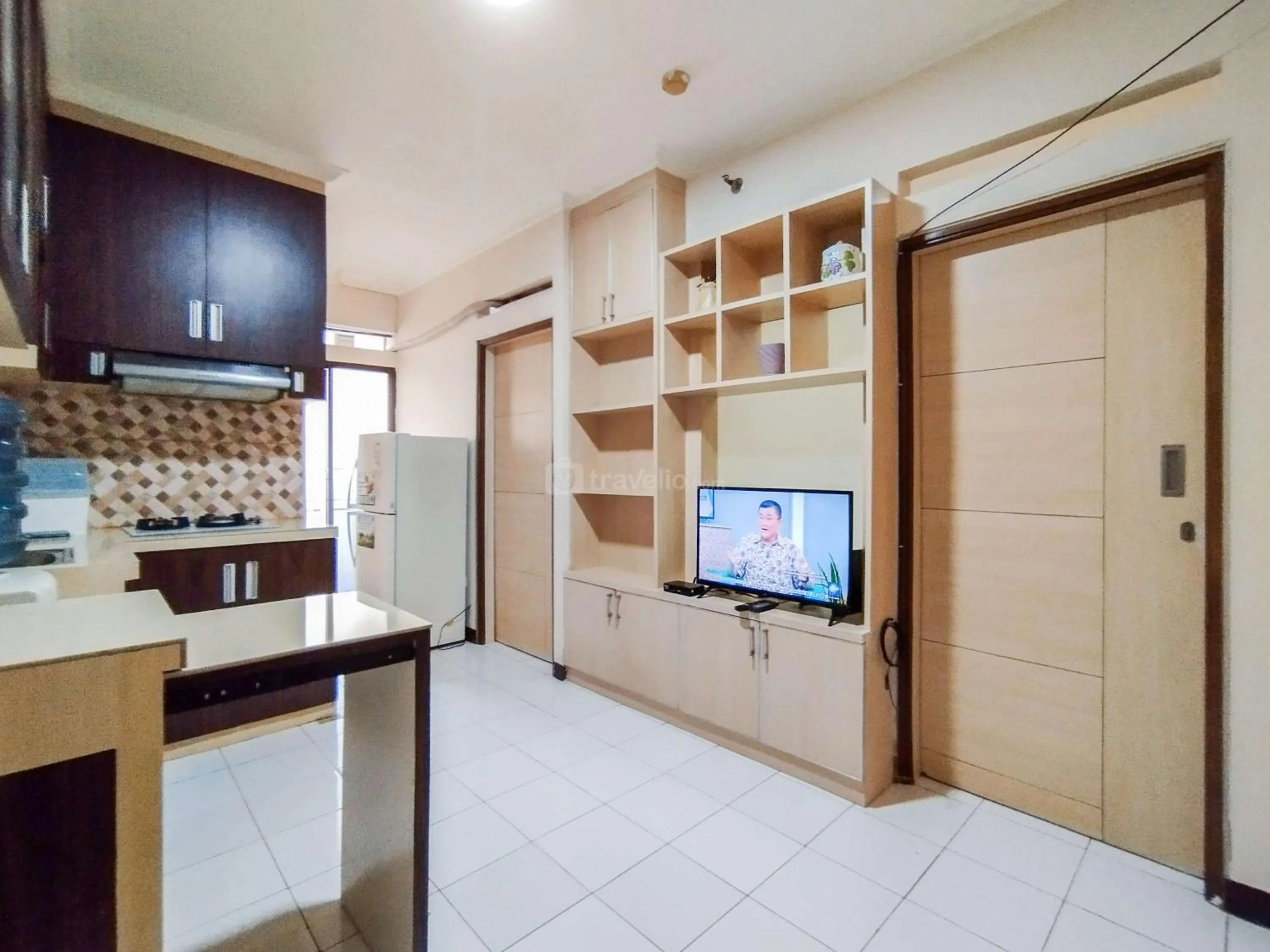 Bed in Serene 2BR Apartment at Gateway Ahmad Yani Cicadas By Travelio