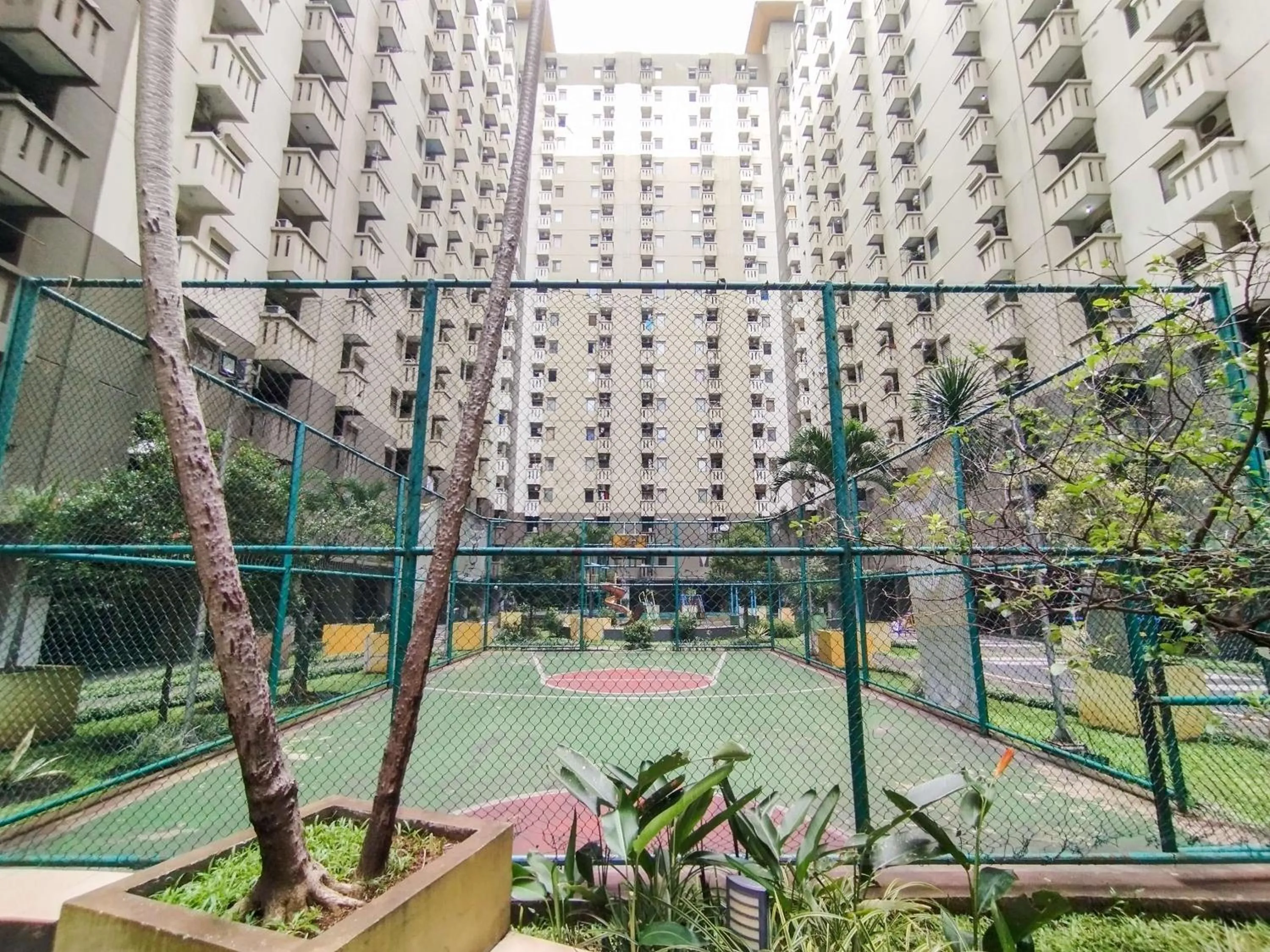 Bed in Serene 2BR Apartment at Gateway Ahmad Yani Cicadas By Travelio