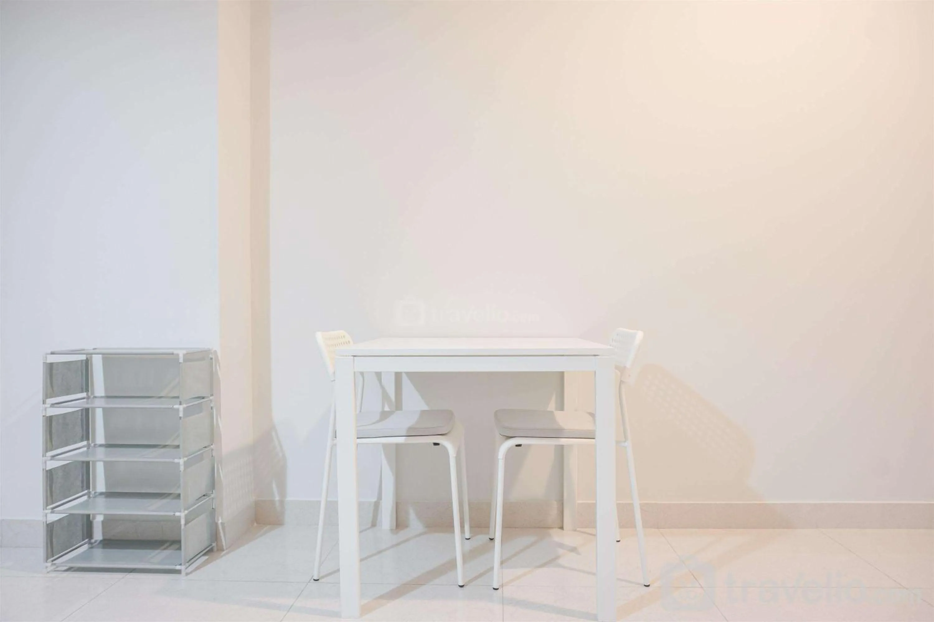 Fancy and Comfort 1BR at Gold Coast Apartment By Travelio