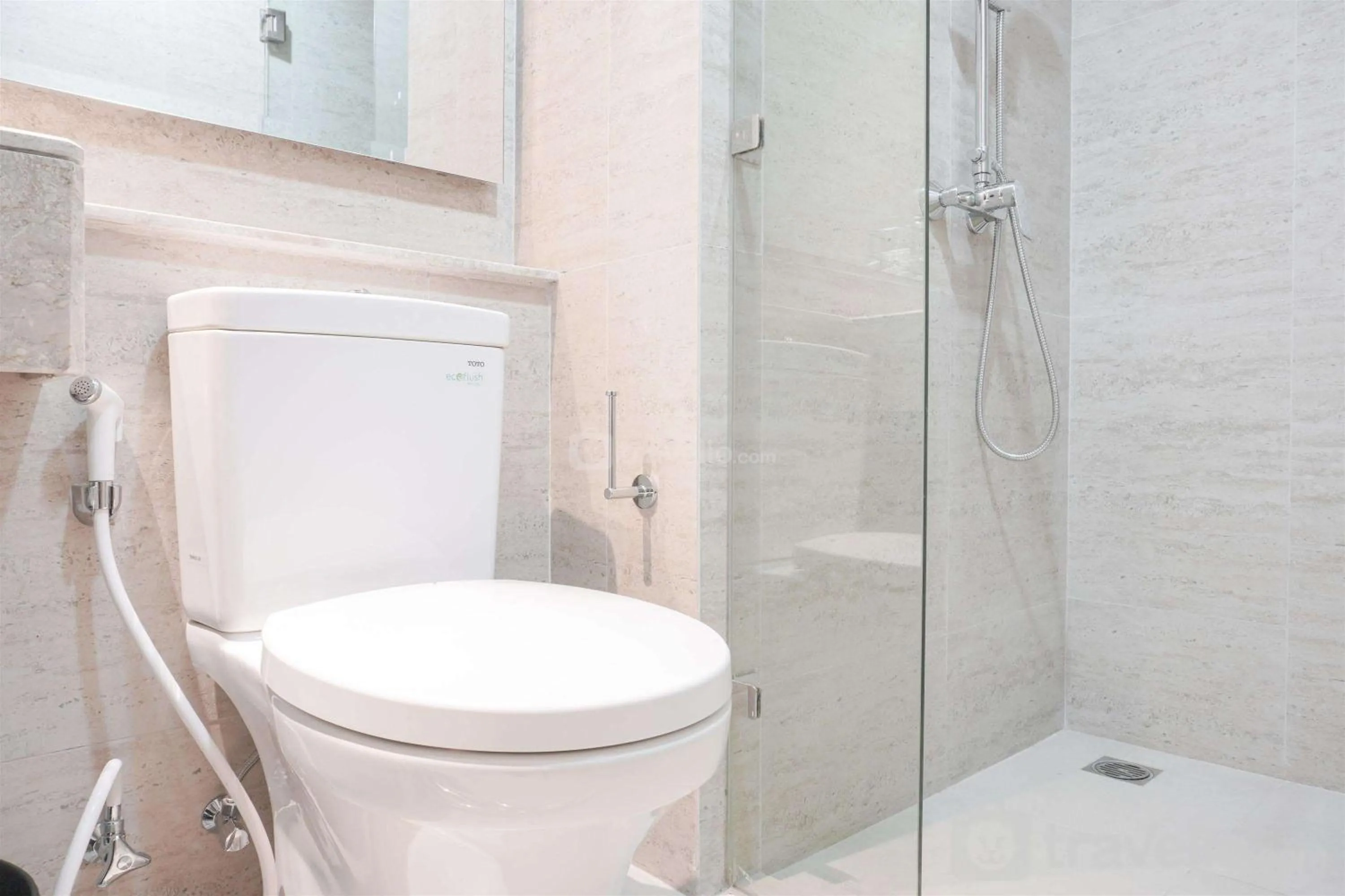 Fancy and Comfort 1BR at Gold Coast Apartment By Travelio