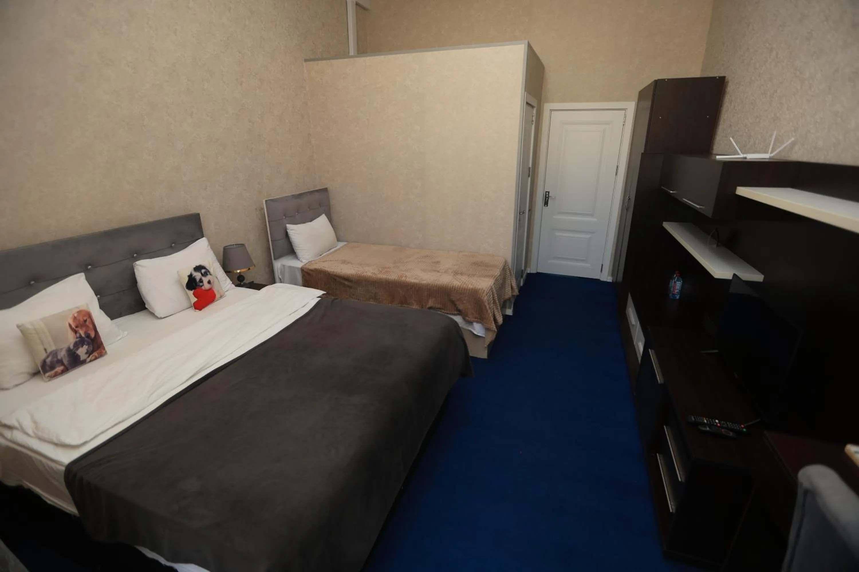 Bed in NH Nizami Hotel