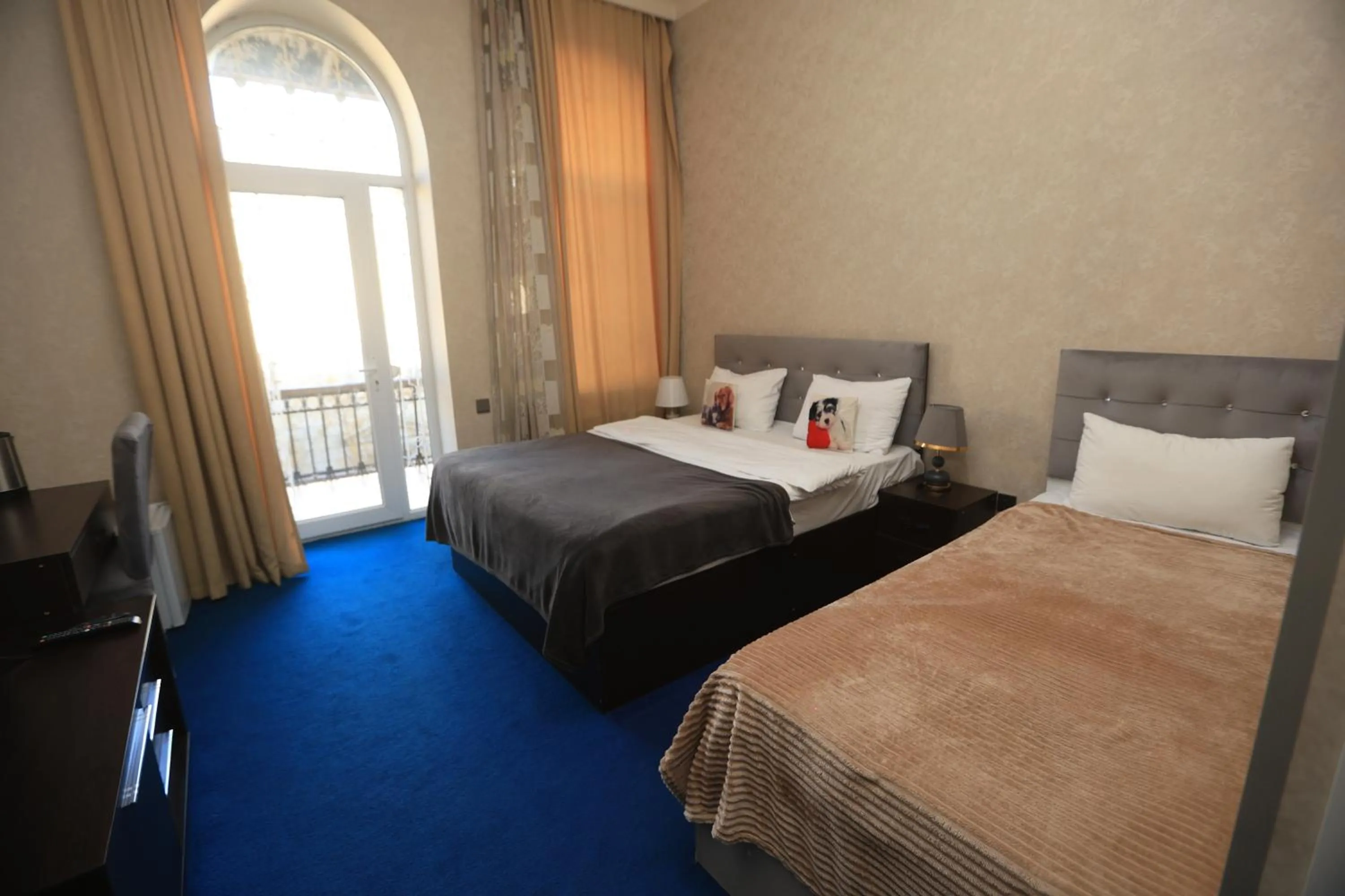 Bed in NH Nizami Hotel