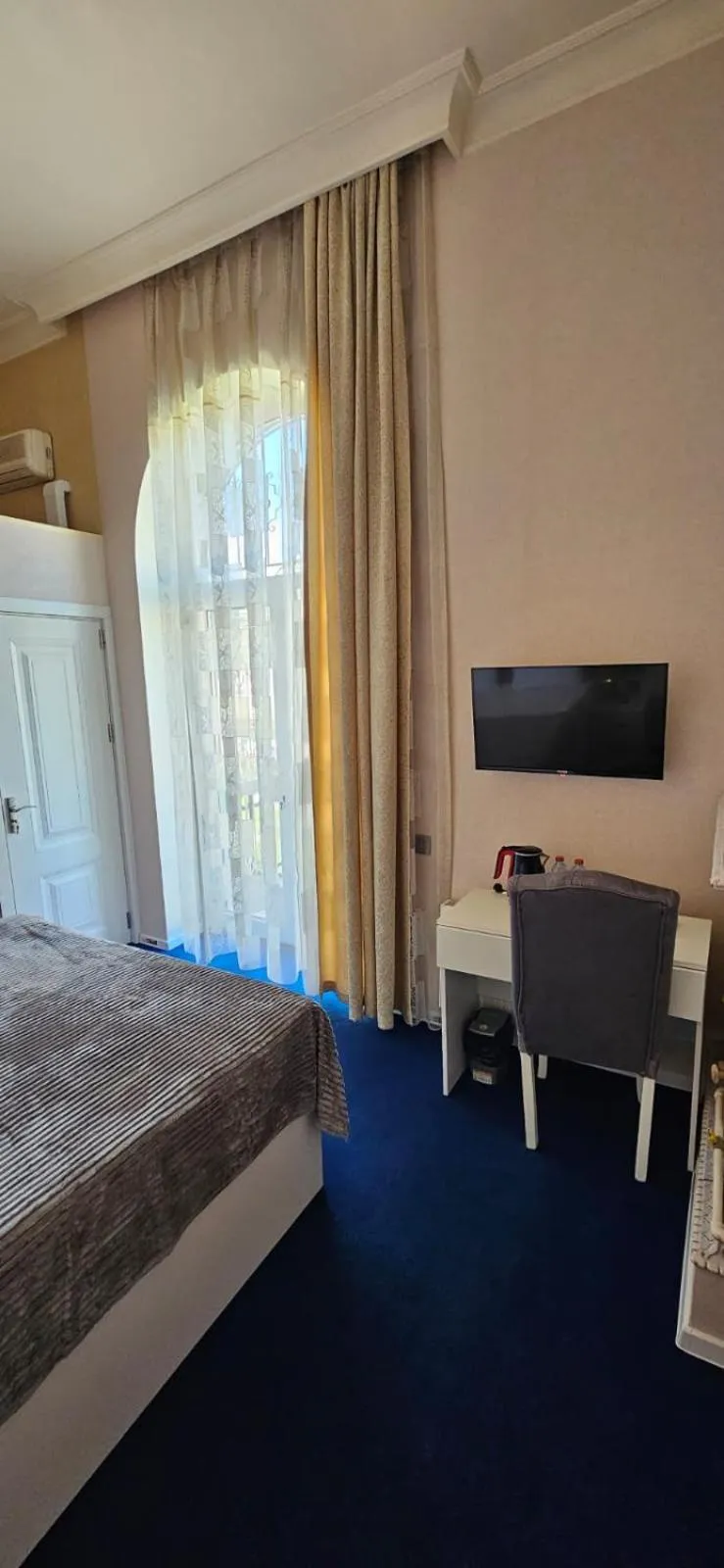 Bed in NH Nizami Hotel