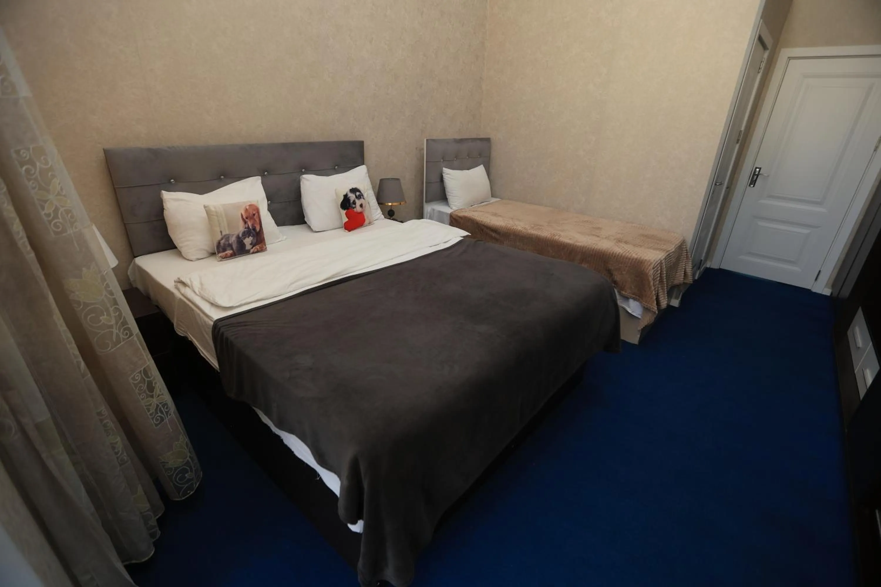 Bed in NH Nizami Hotel