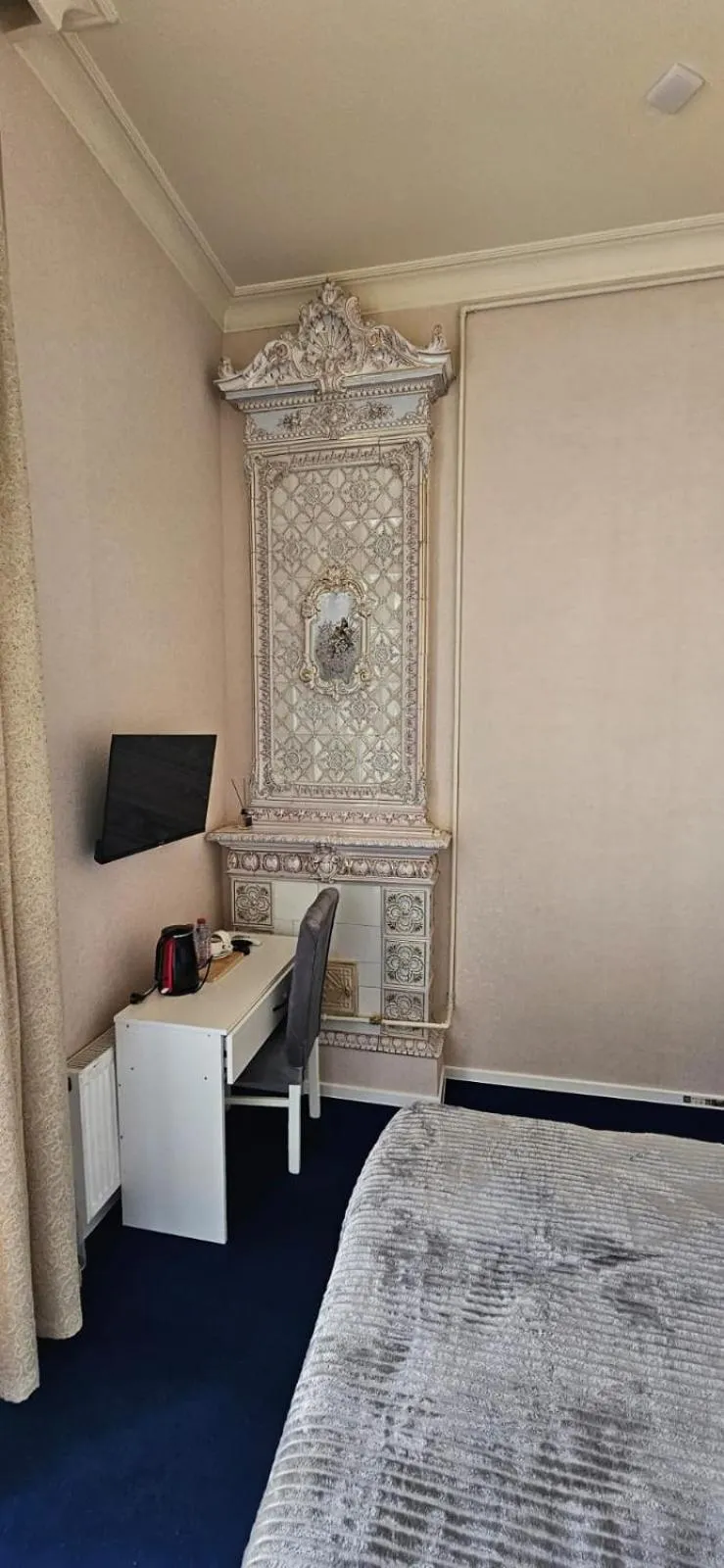 Bed in NH Nizami Hotel