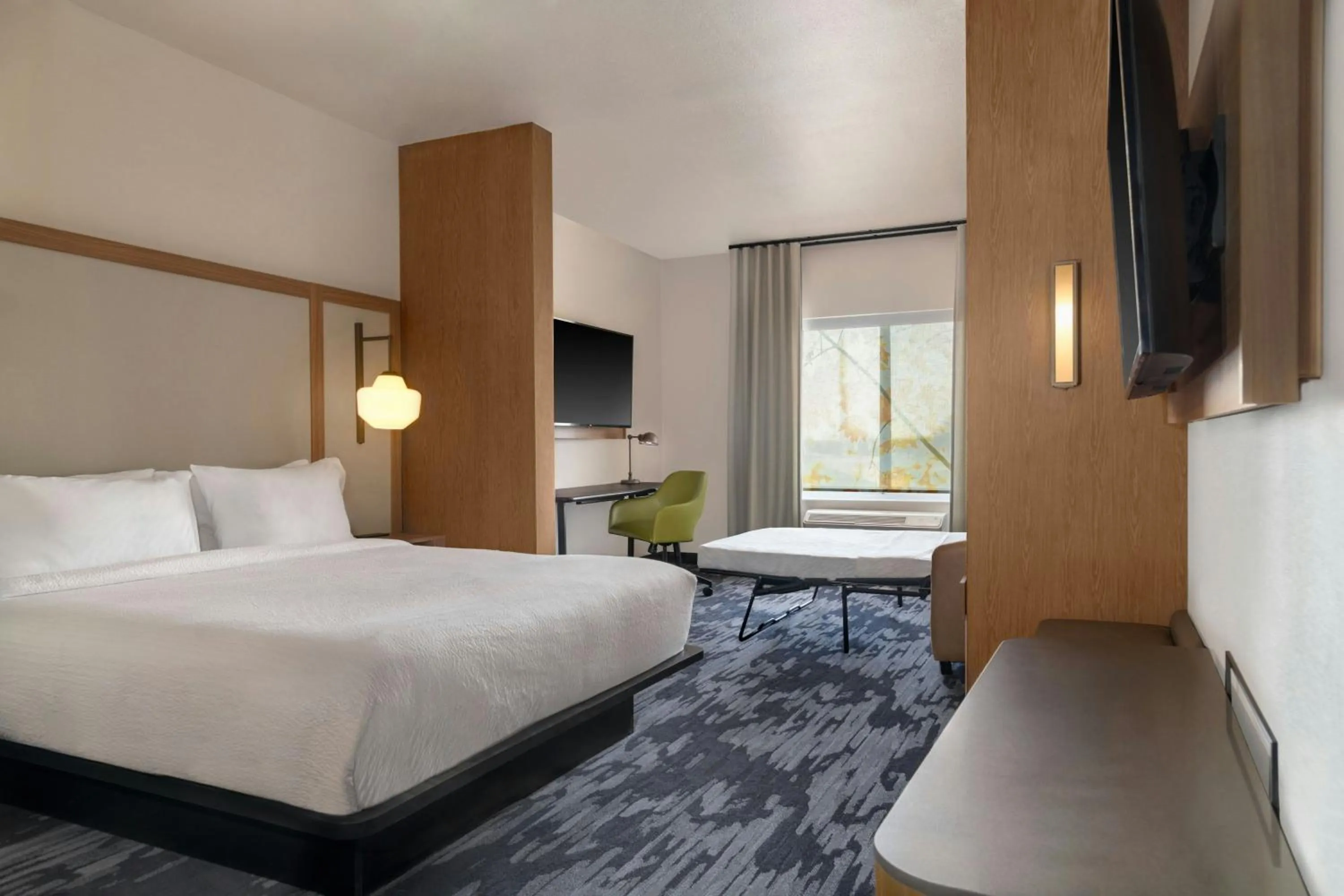 Photo of the whole room, Bed in Fairfield by Marriott Inn & Suites Kansas City at The Legends