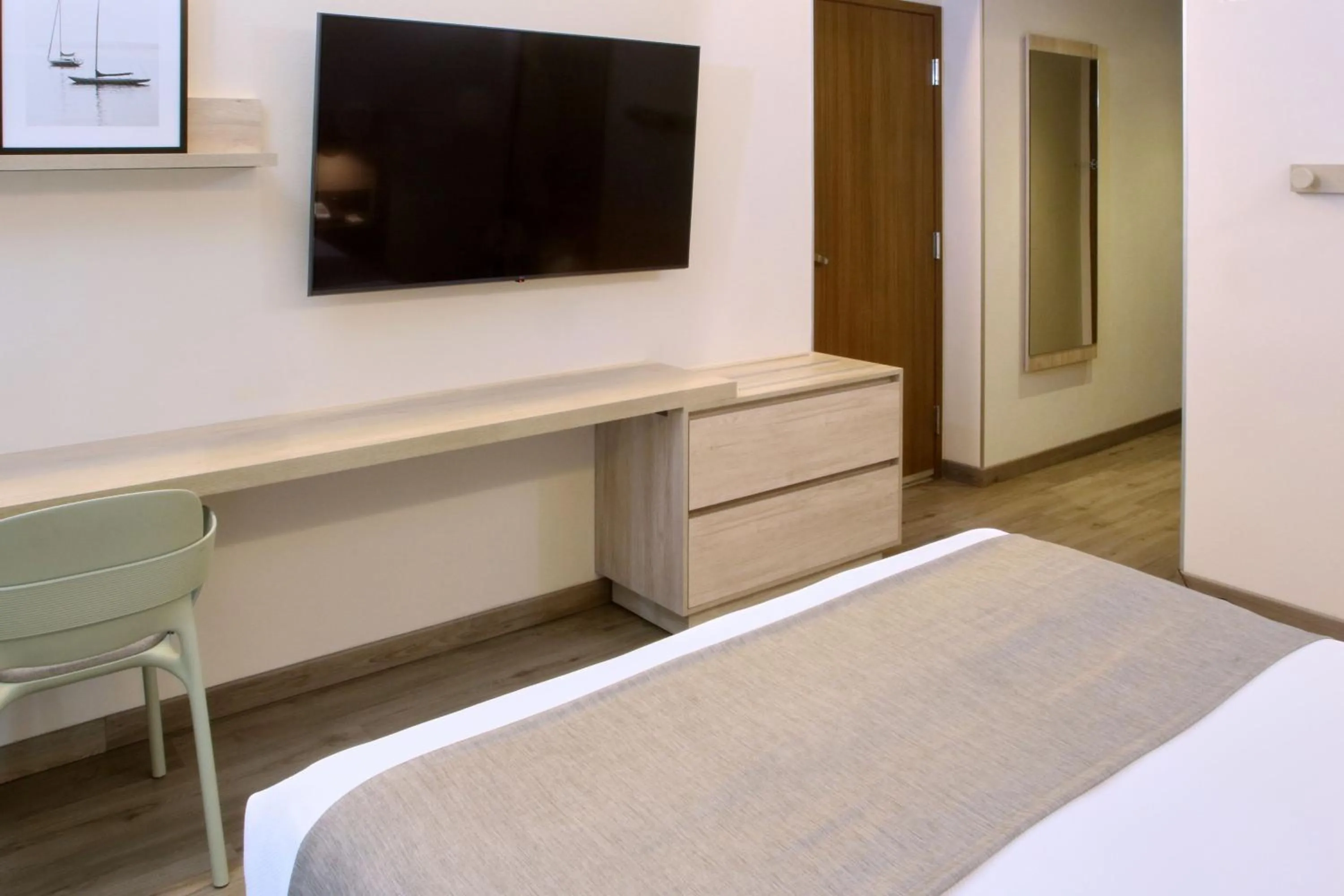 Photo of the whole room, Bed in City Express Plus by Marriott Monterrey Centro