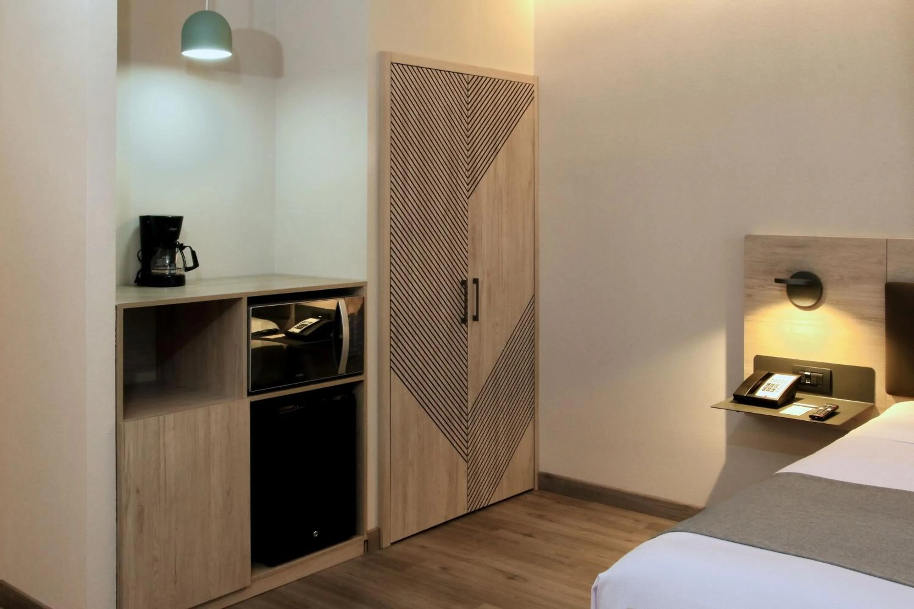 Photo of the whole room, Bed in City Express Plus by Marriott Monterrey Centro