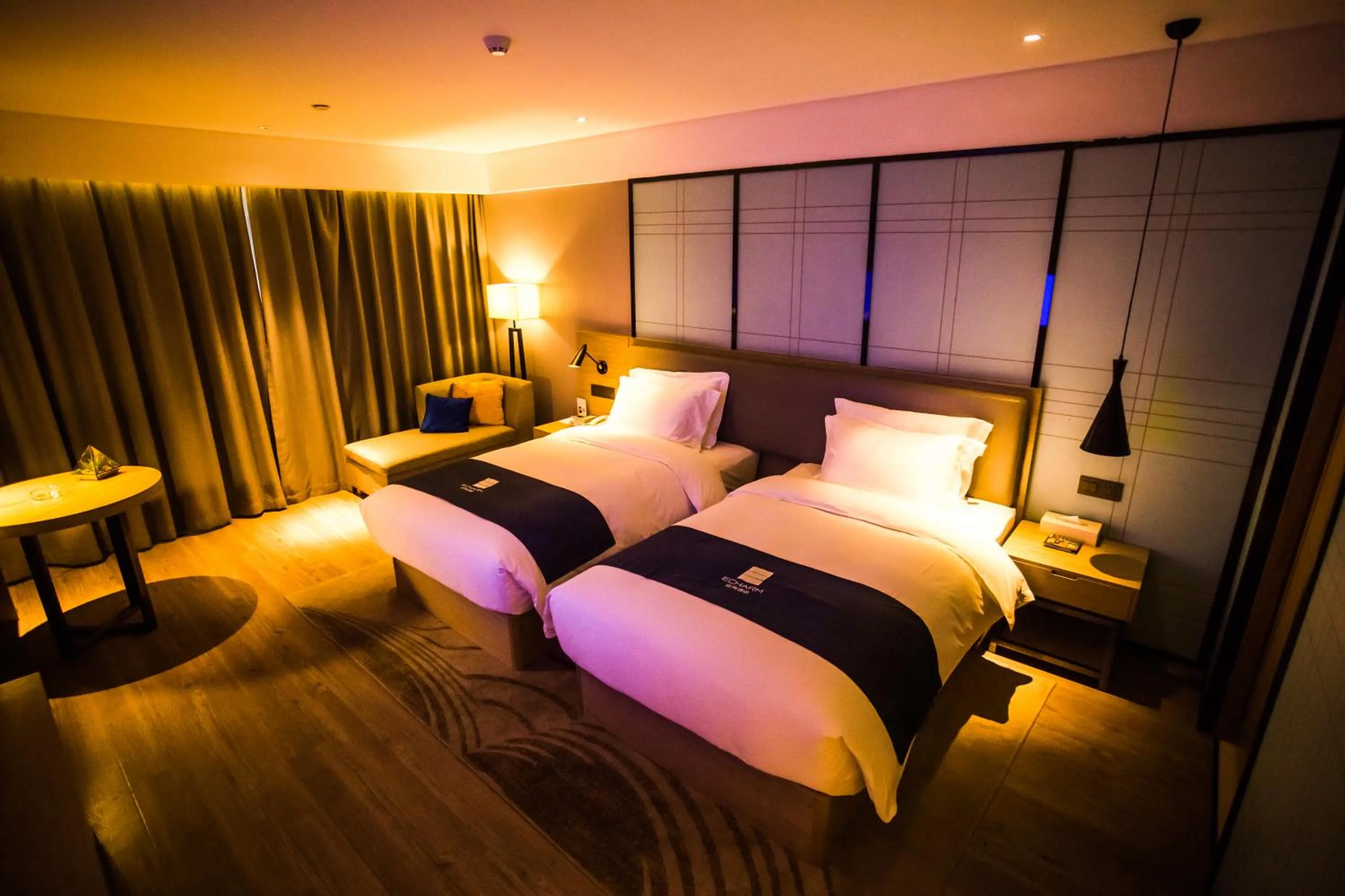 Bed in Echarm Hotel - Jingmen Yintai City Jingchu Institute of Technology