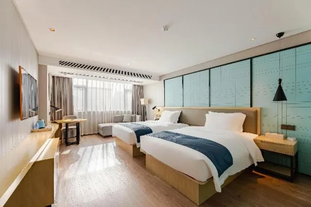 Photo of the whole room, Bed in Echarm Hotel - Jingmen Yintai City Jingchu Institute of Technology
