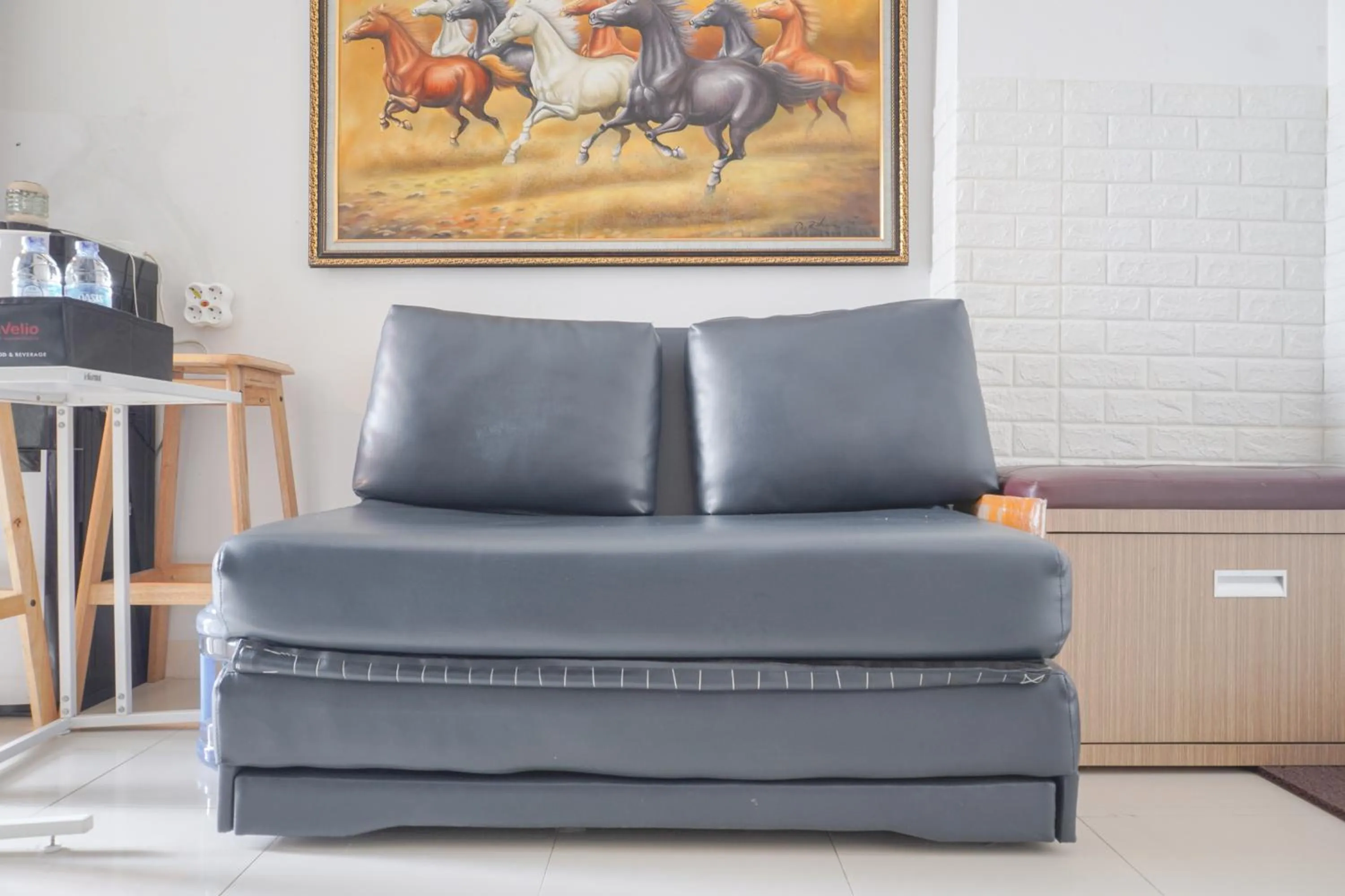 Seating area in Best Startegic 2BR at Bassura Apartment By Travelio