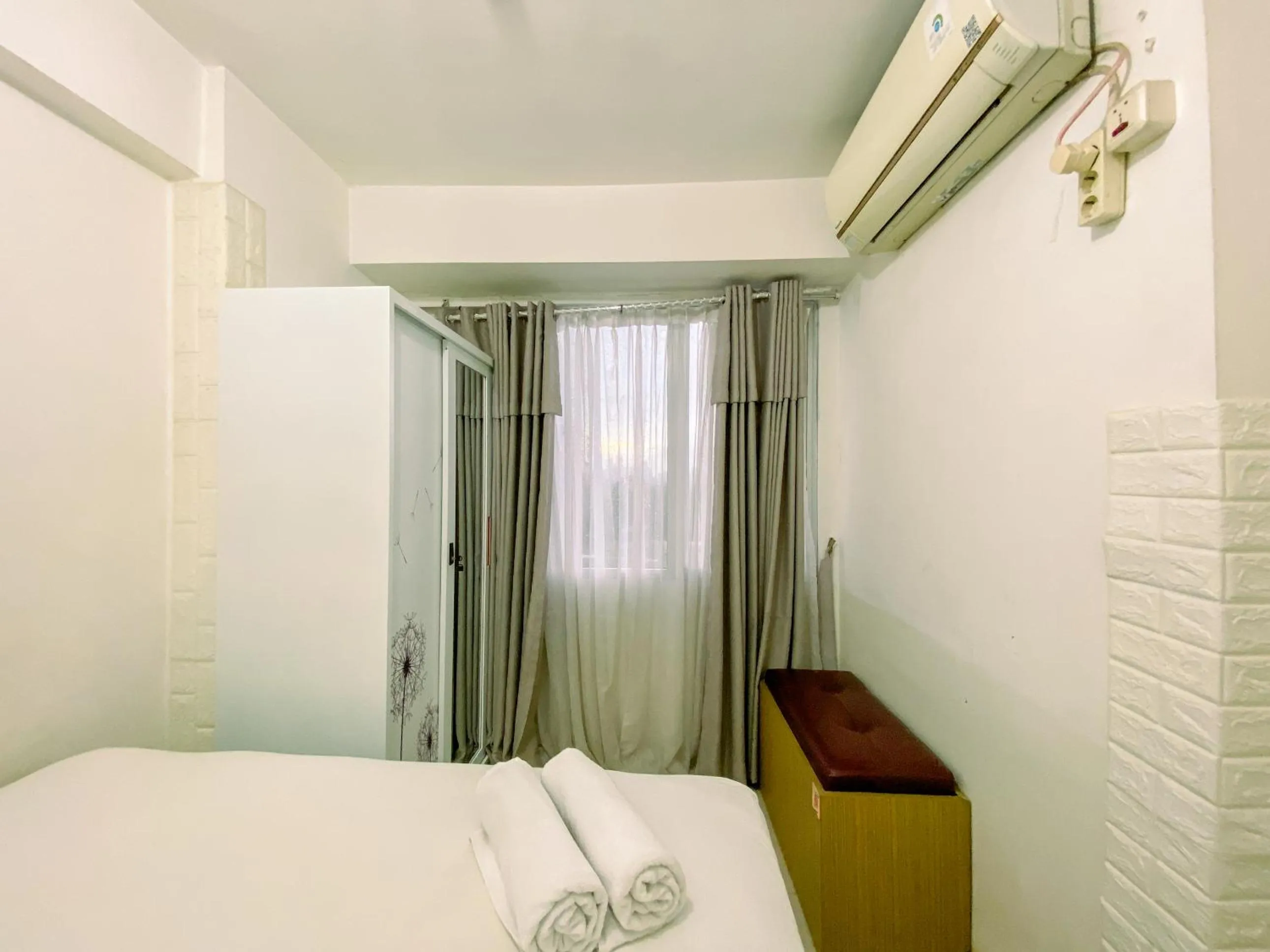 Bed in Best Startegic 2BR at Bassura Apartment By Travelio