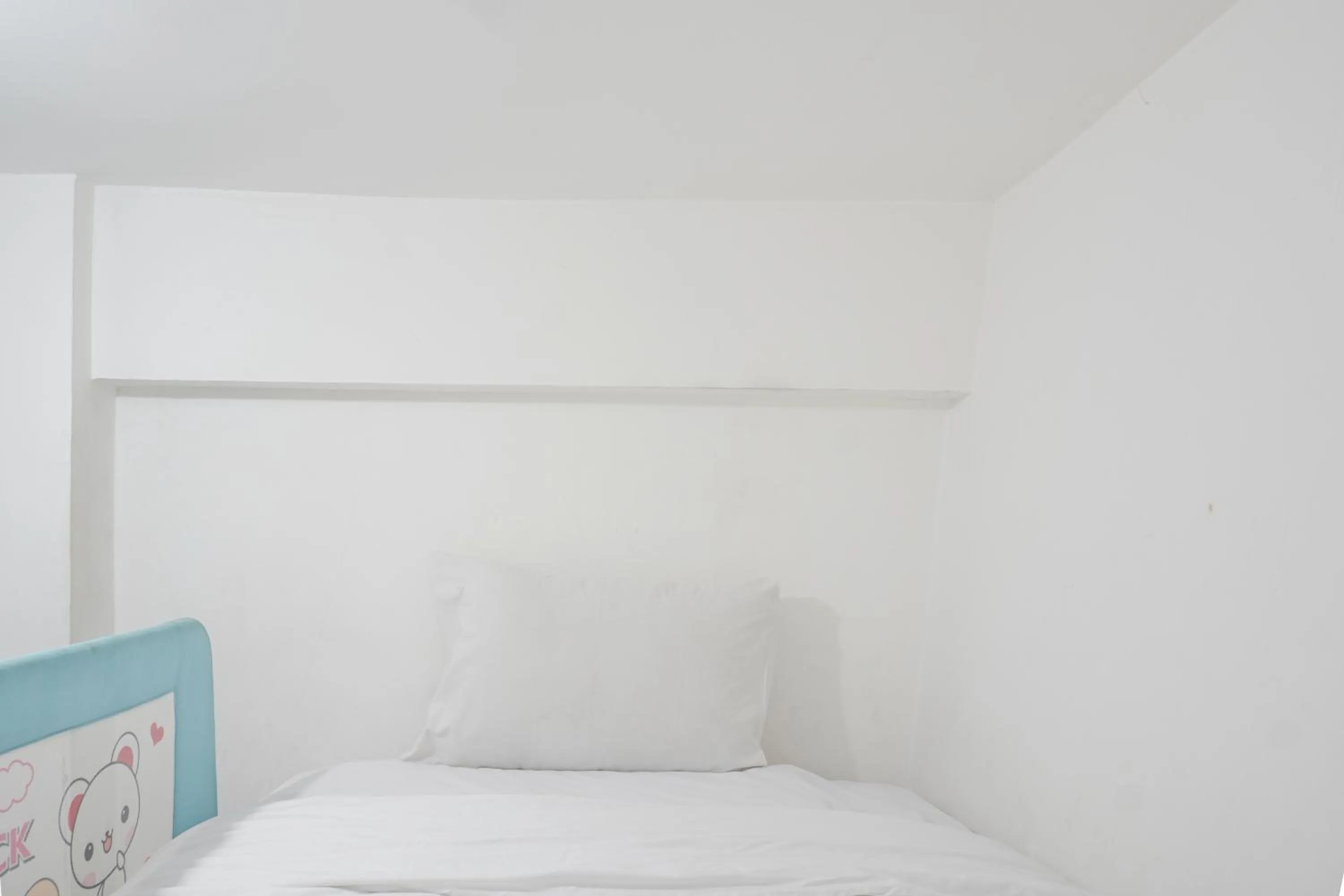 Bed in Best Startegic 2BR at Bassura Apartment By Travelio