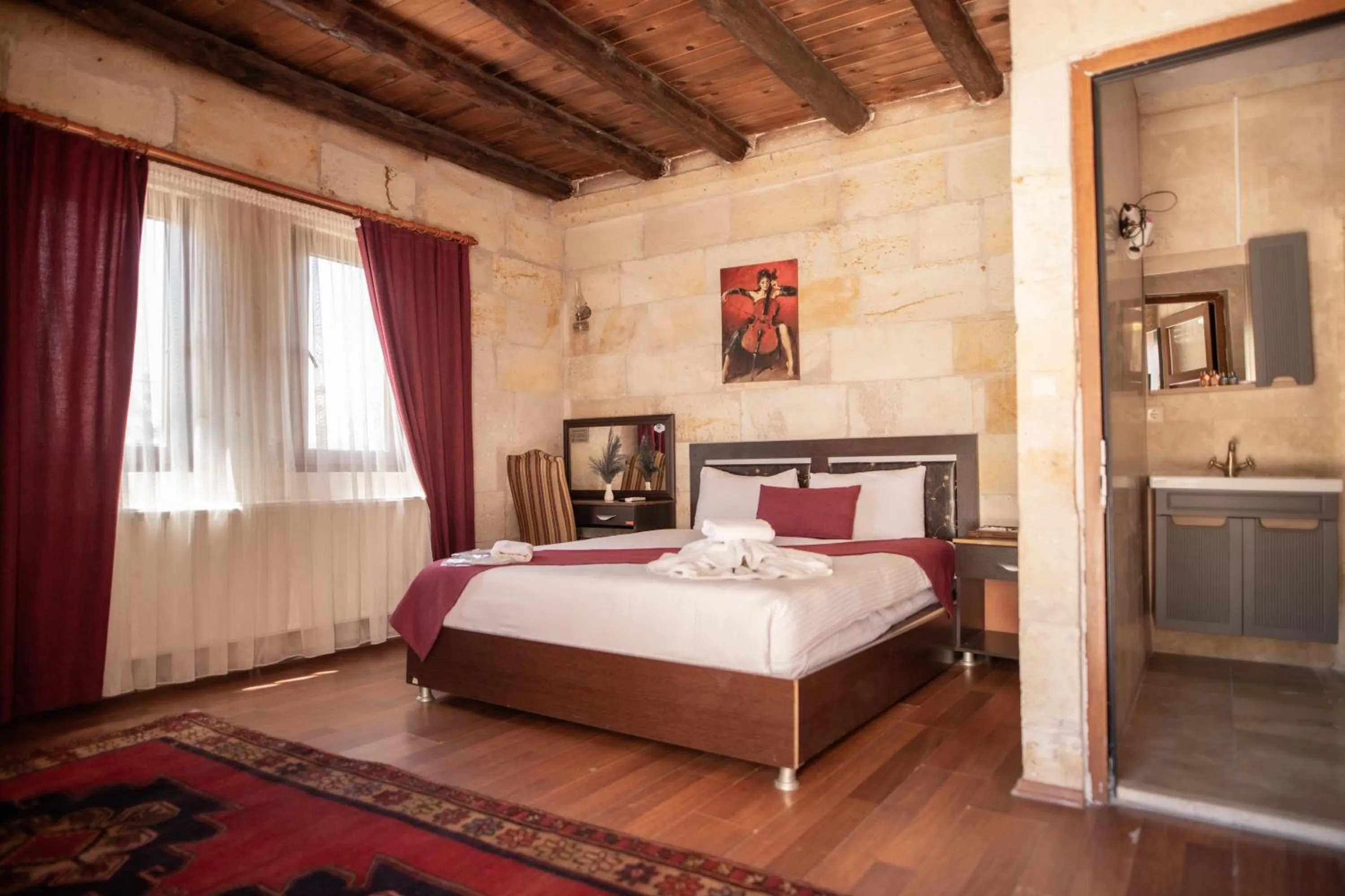 Bed in Güven Cave Hotel