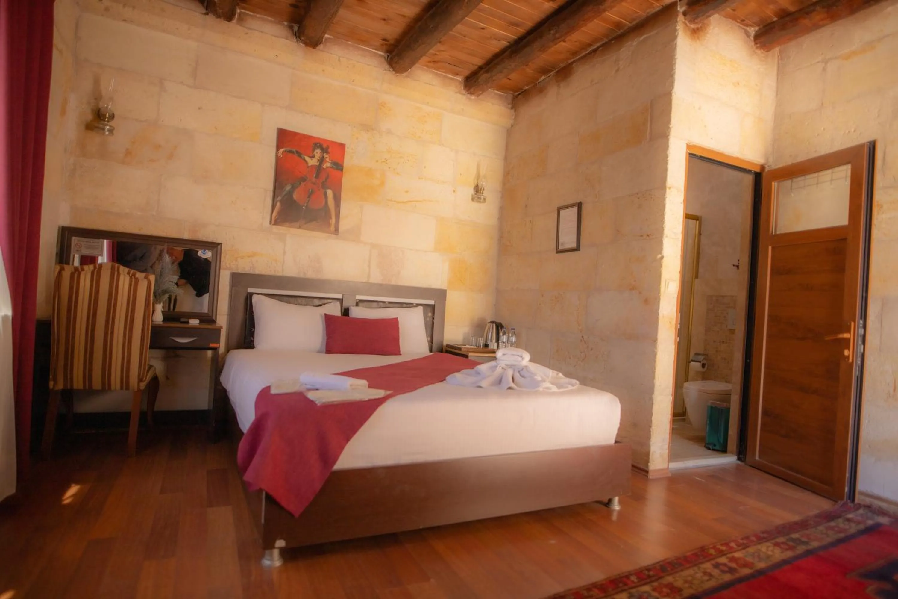 Photo of the whole room, Bed in Güven Cave Hotel