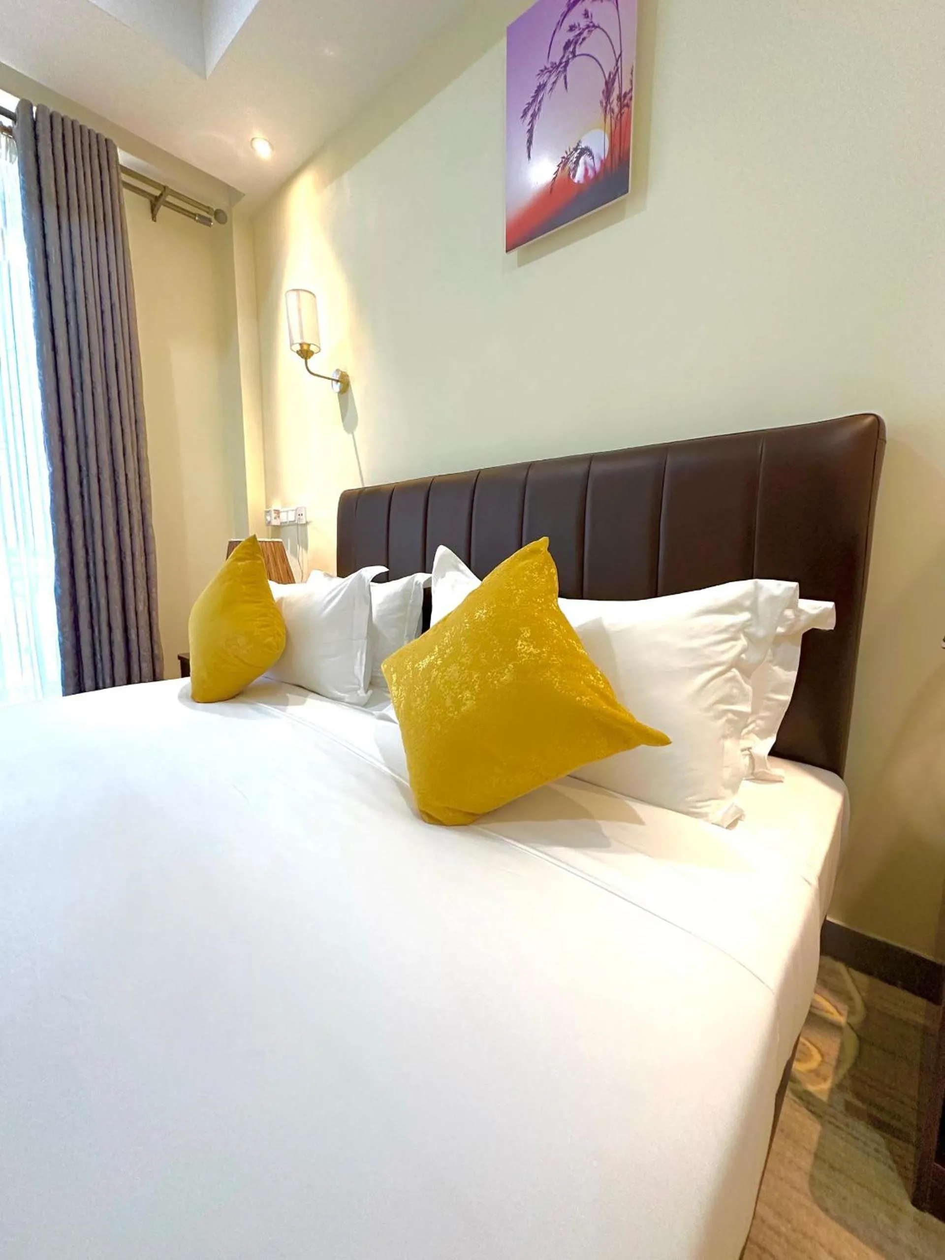 Bed in KIJICHI GATEWAY Hotel