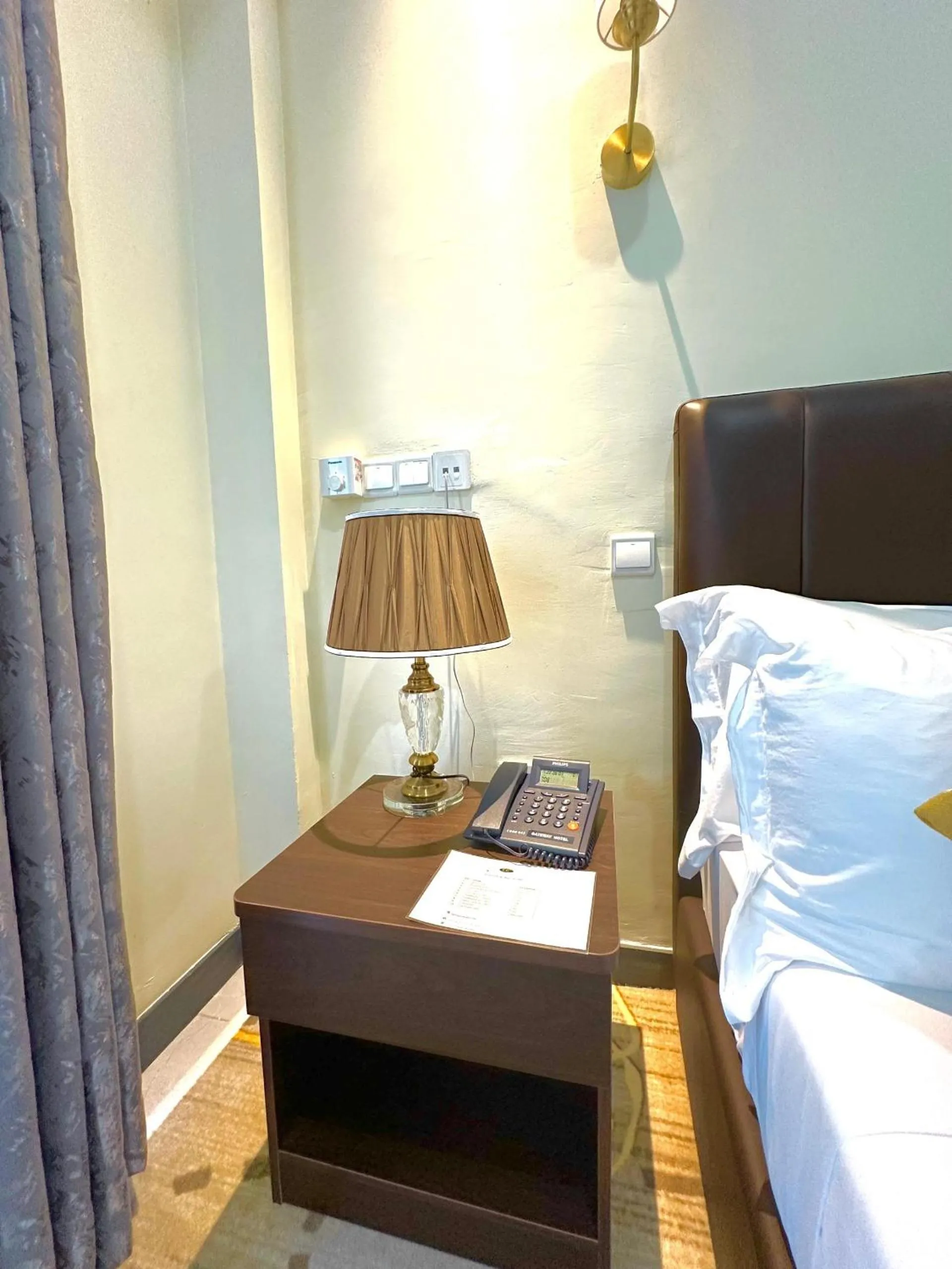 Bed in KIJICHI GATEWAY Hotel