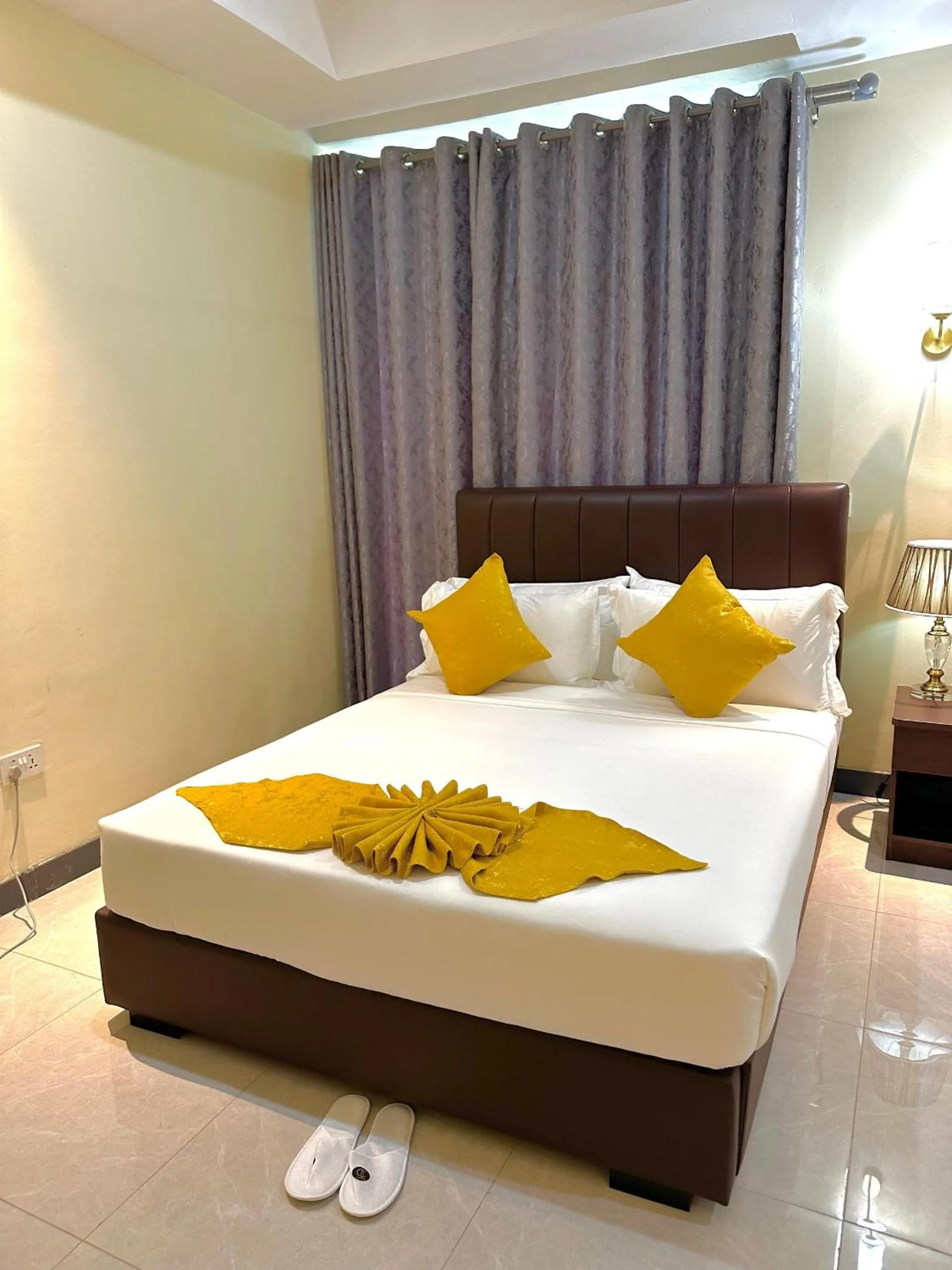 Bed in KIJICHI GATEWAY Hotel