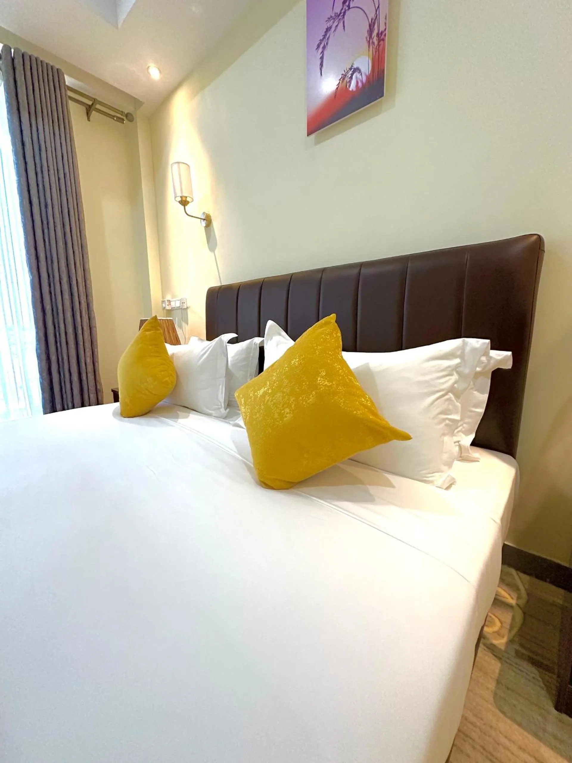 Bed in KIJICHI GATEWAY Hotel