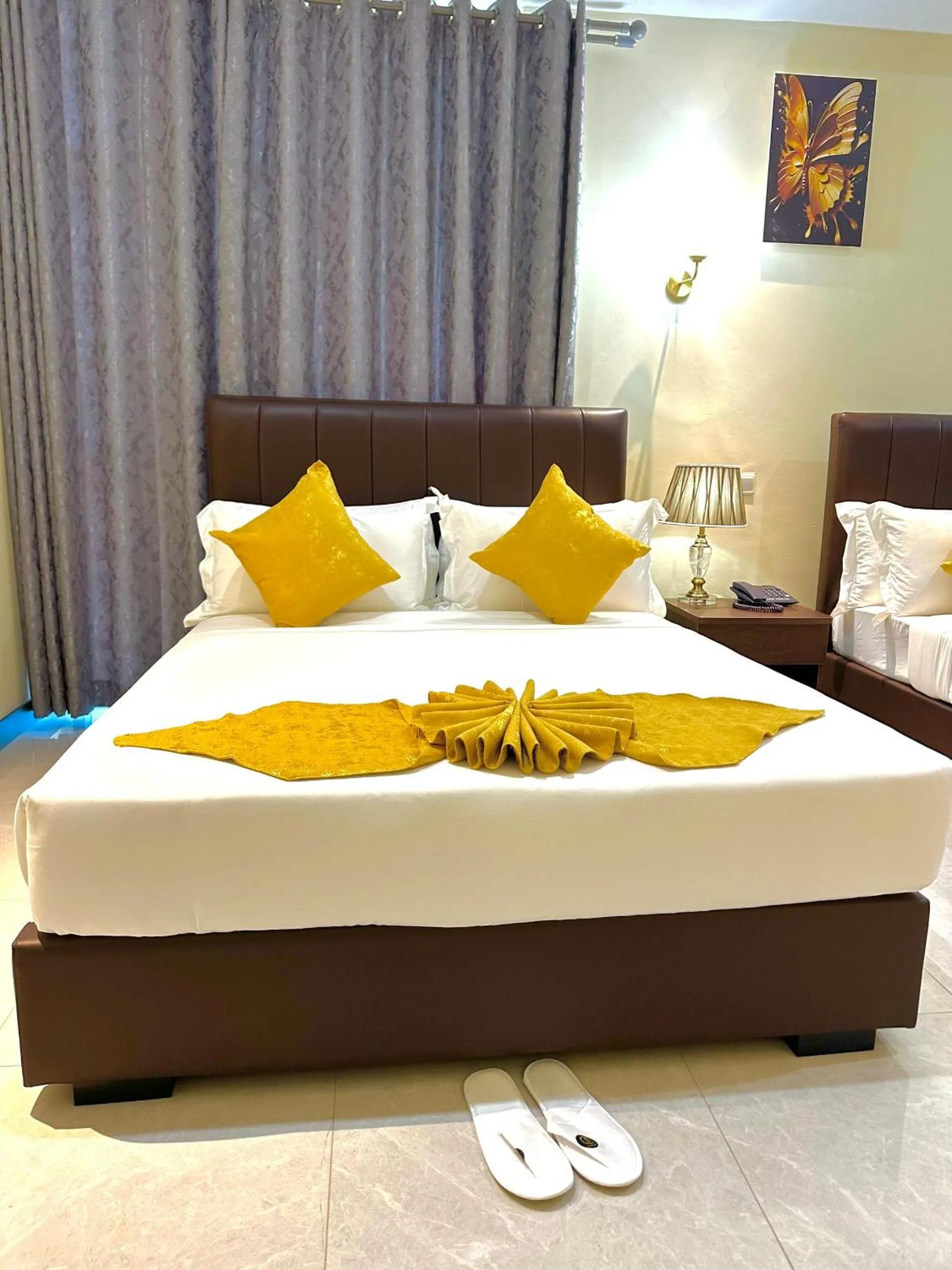 Bed in KIJICHI GATEWAY Hotel