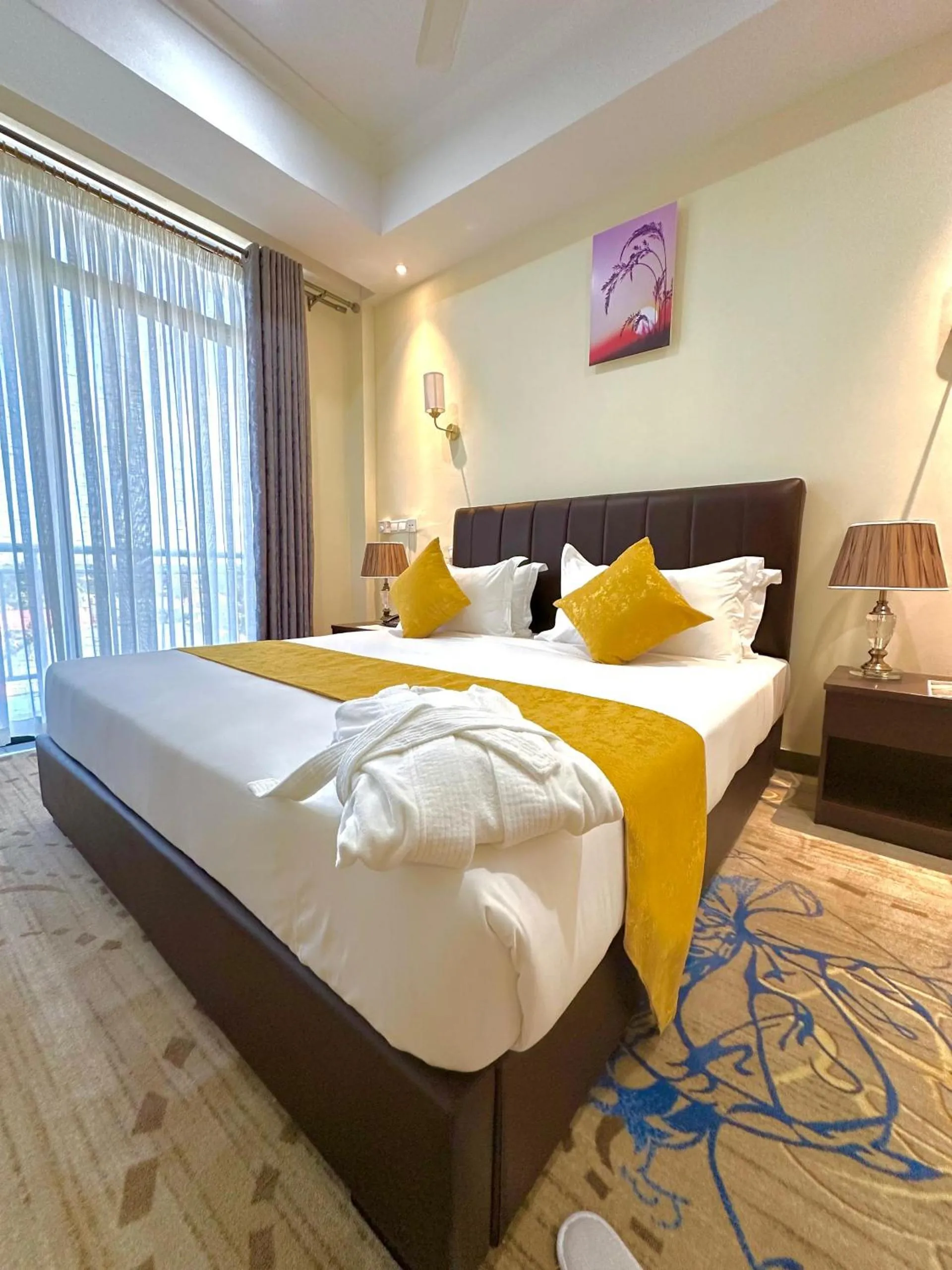 Bed in KIJICHI GATEWAY Hotel