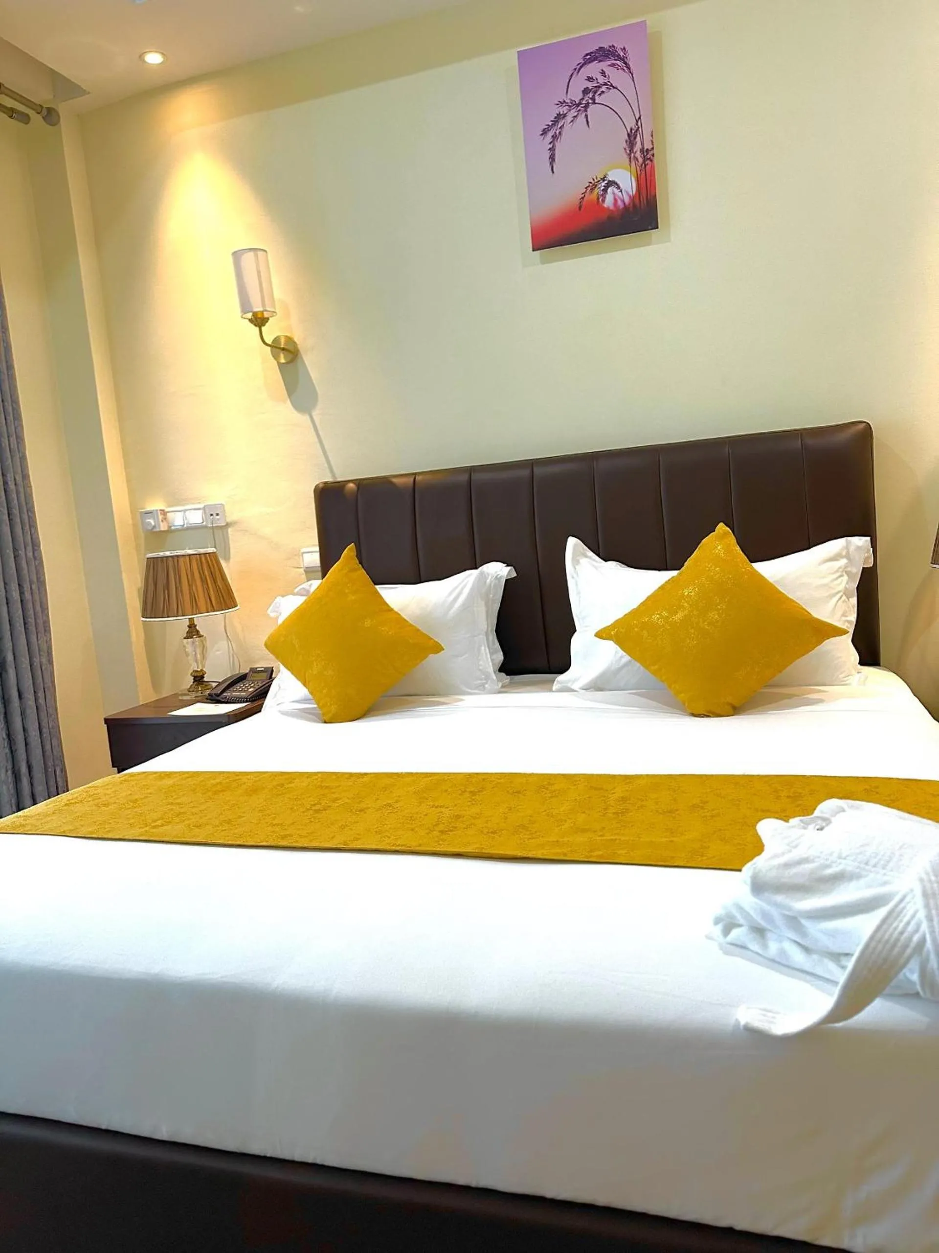Bed in KIJICHI GATEWAY Hotel