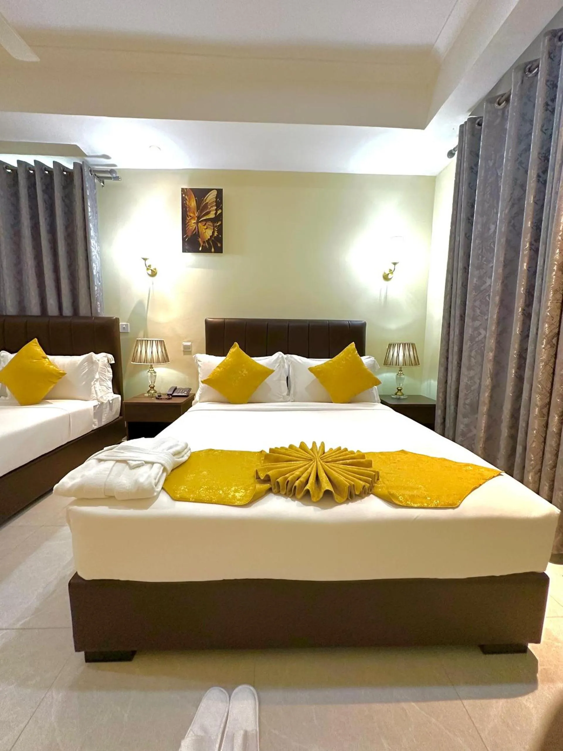Bed in KIJICHI GATEWAY Hotel
