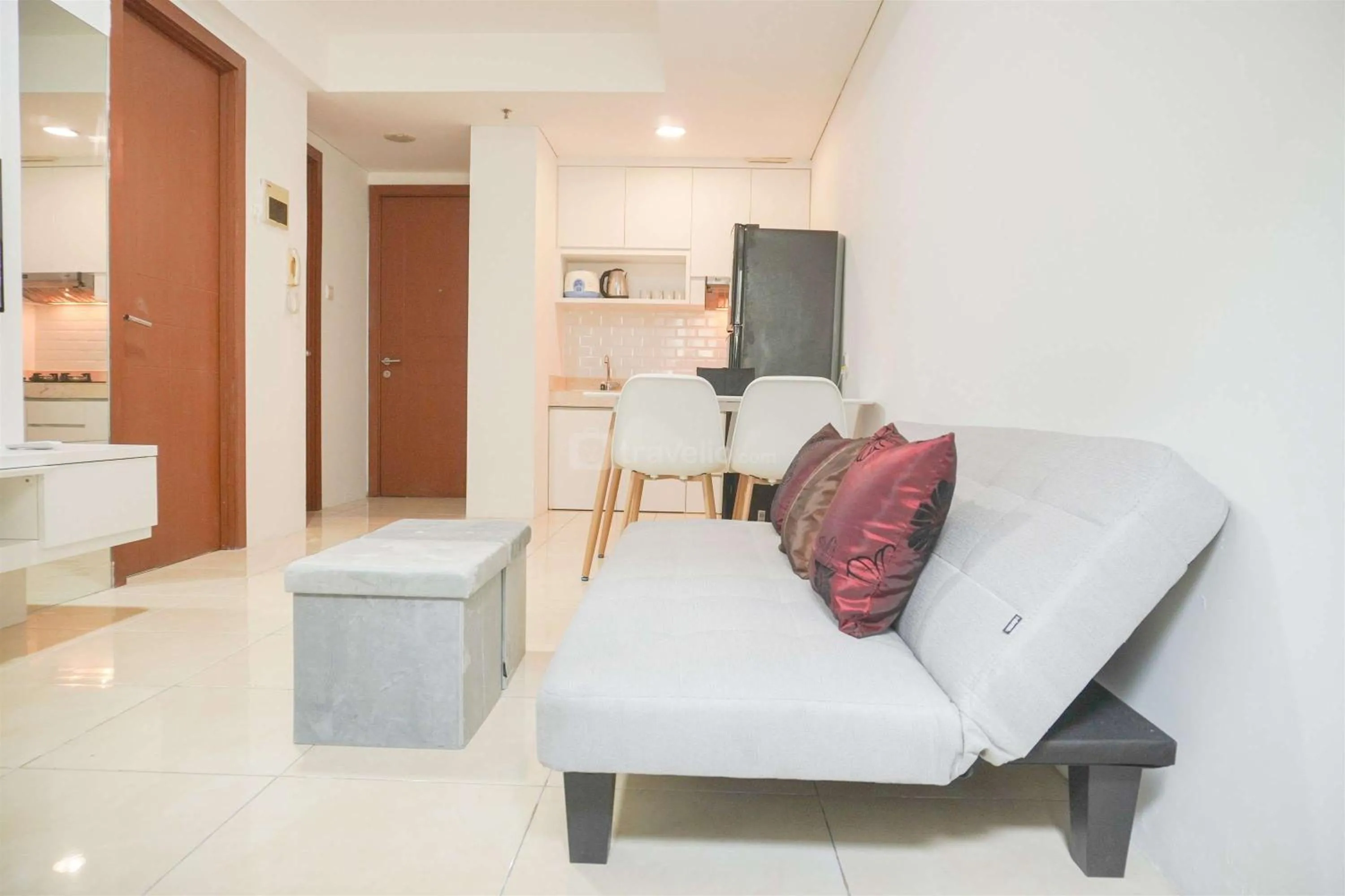 Bed in Modern and Homey 2BR at MT Haryono Square Apartment By Travelio