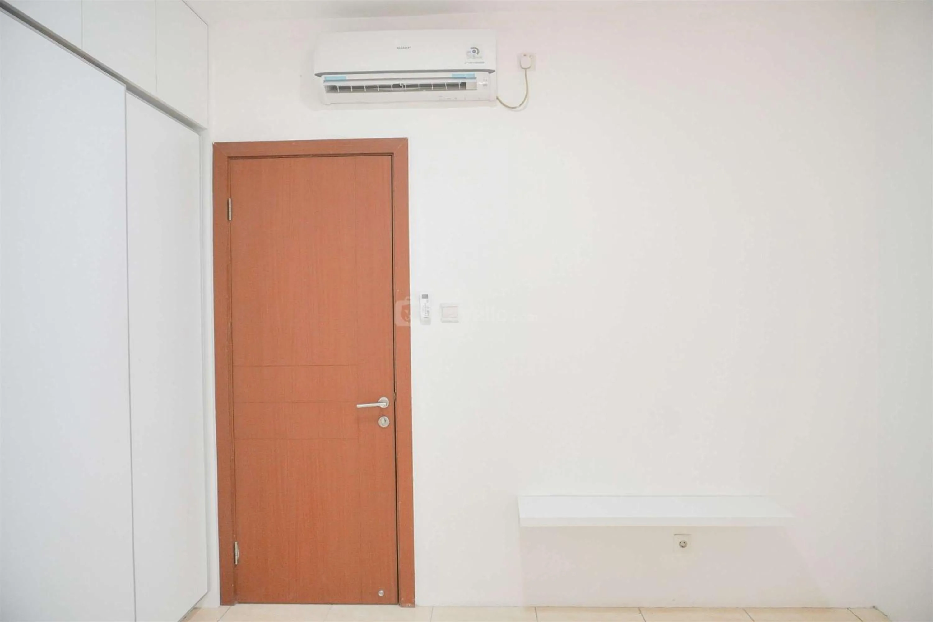 Bed in Modern and Homey 2BR at MT Haryono Square Apartment By Travelio