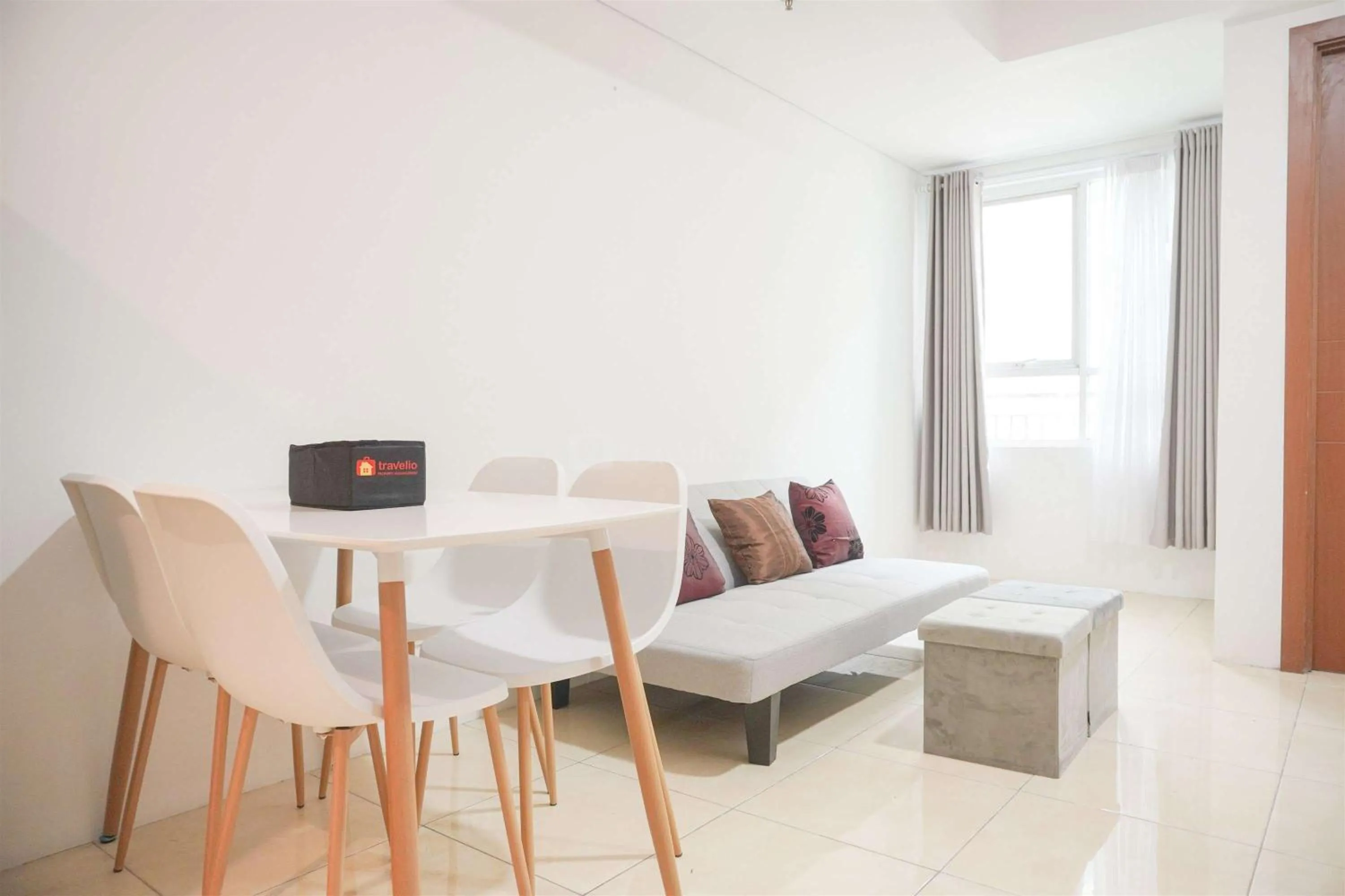 Bed in Modern and Homey 2BR at MT Haryono Square Apartment By Travelio